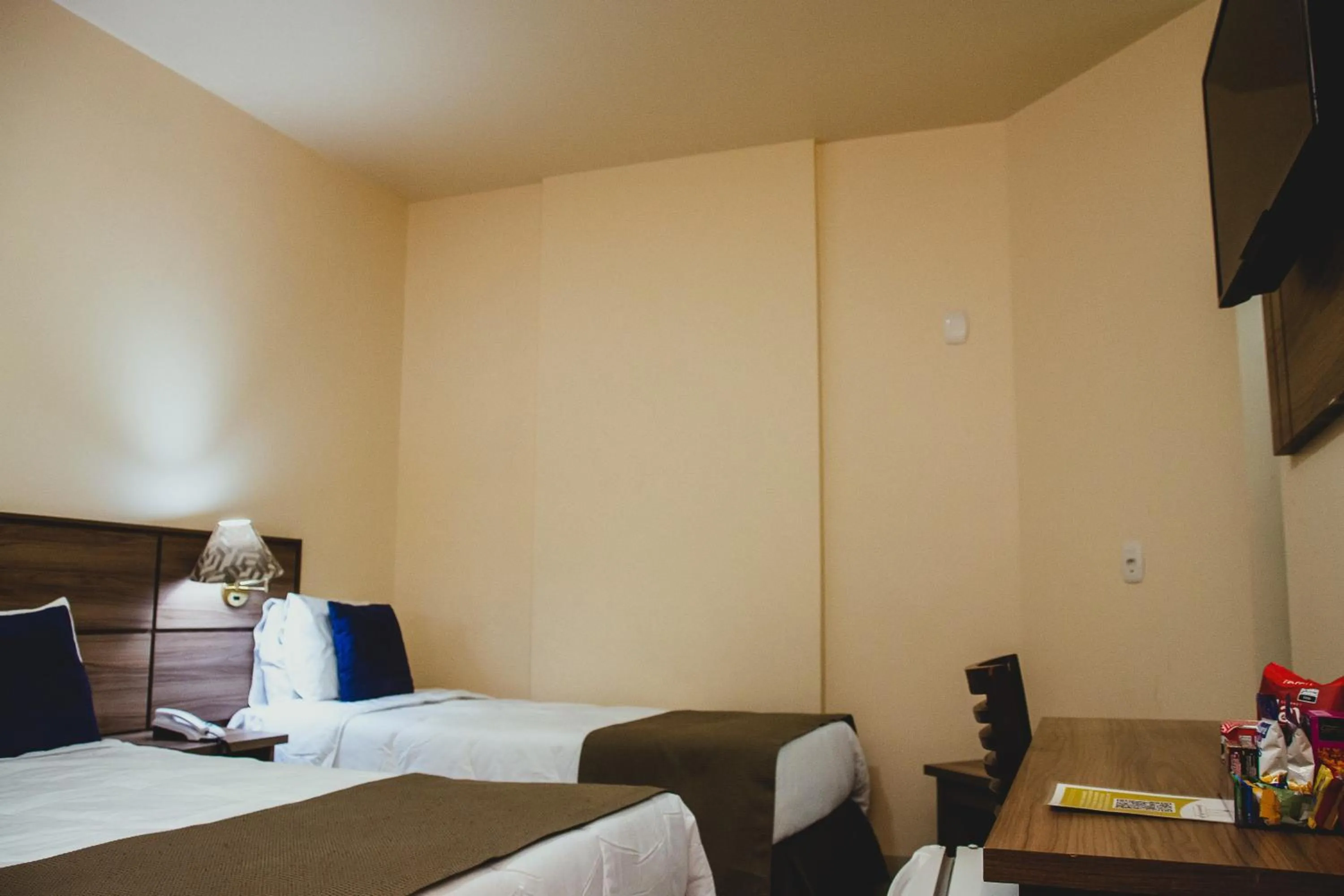 Bedroom, Bed in Fenix Hotel Pouso Alegre