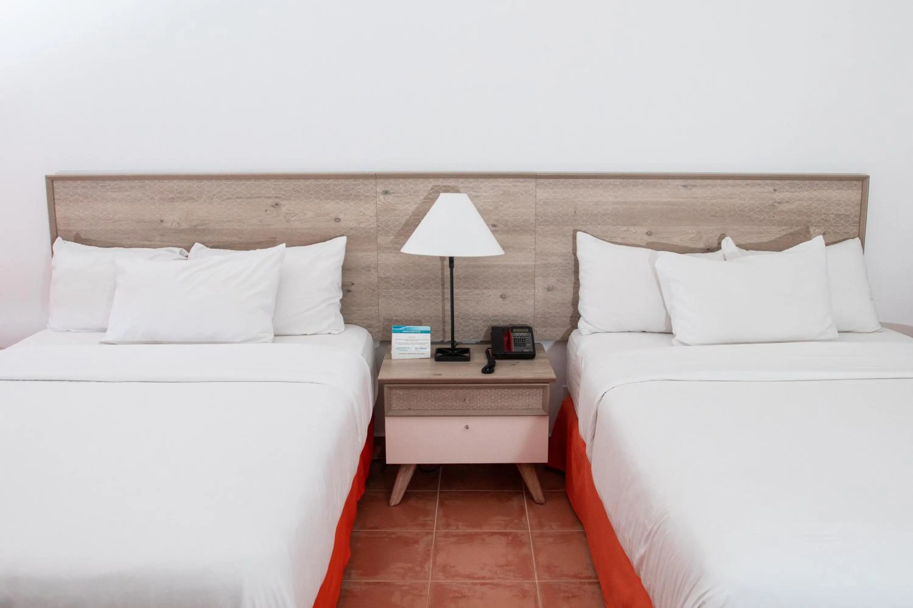 Bed in Grand Decameron Panama, A Trademark All Inclusive Resort