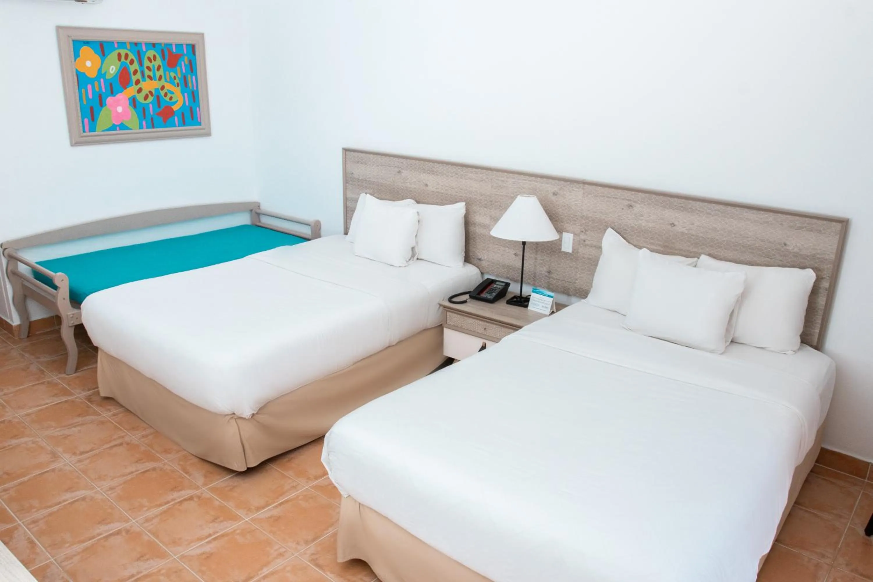 Bed in Grand Decameron Panama, A Trademark All Inclusive Resort