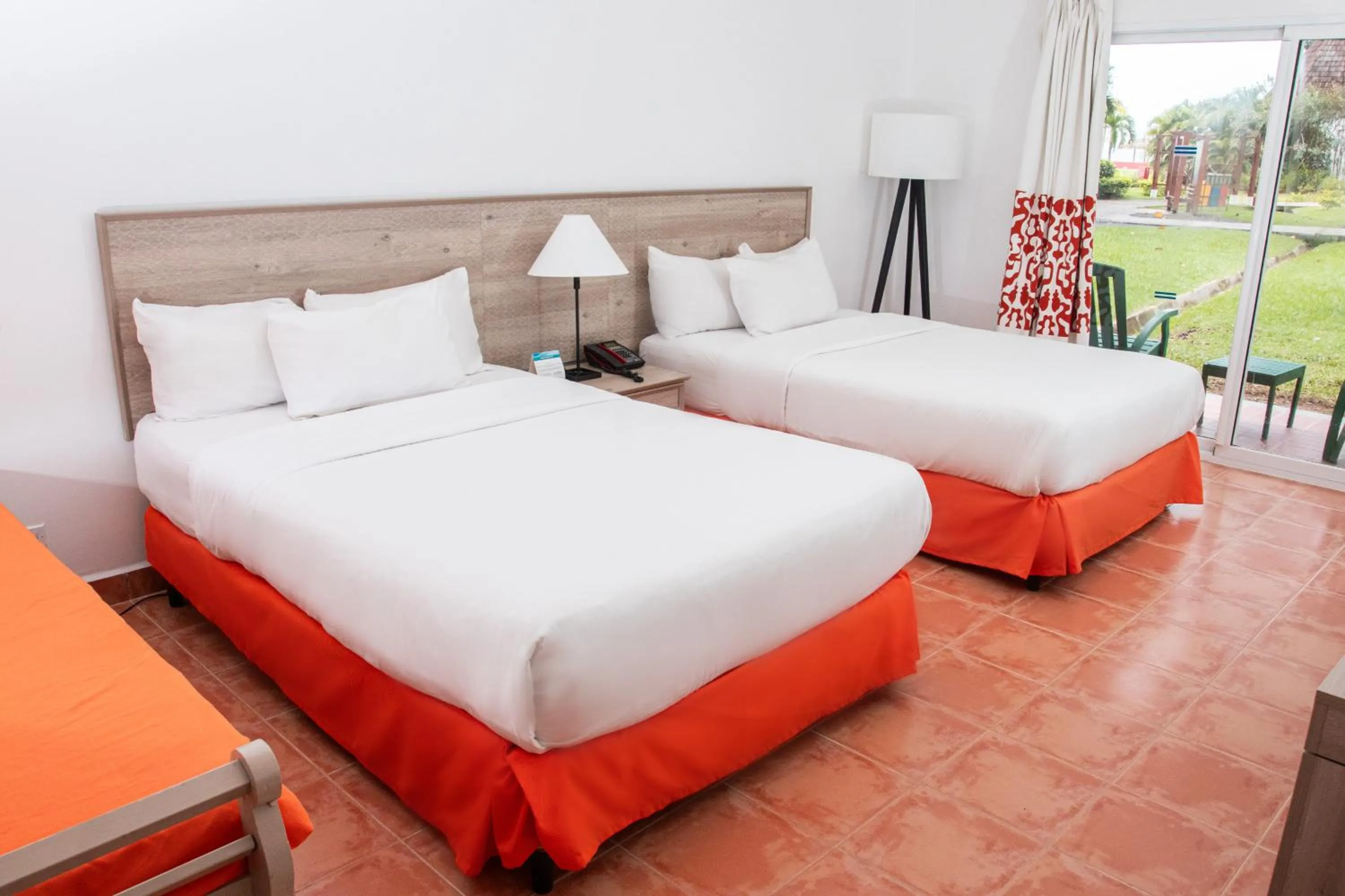 Bed in Grand Decameron Panama, A Trademark All Inclusive Resort