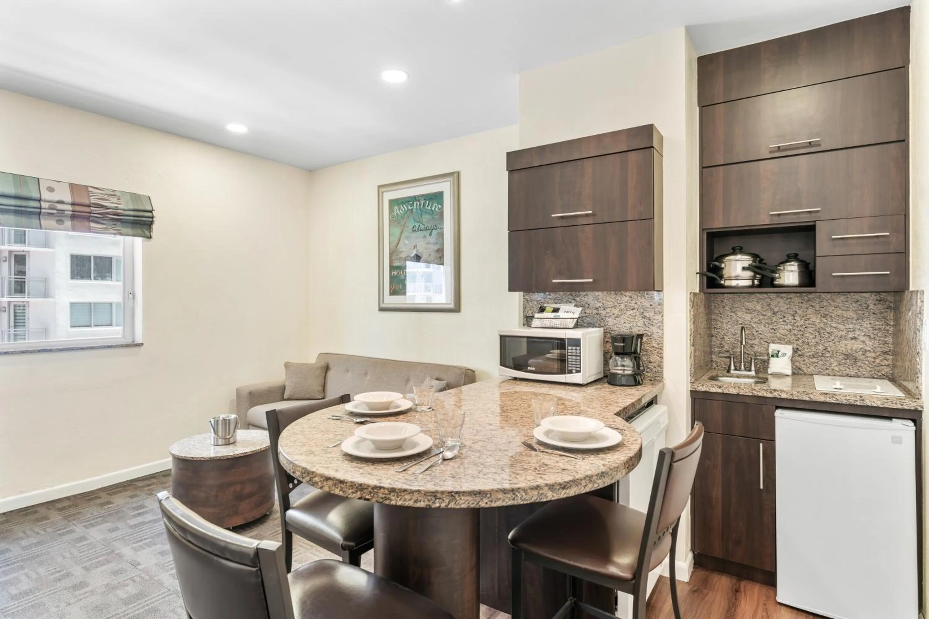 Kitchen or kitchenette in Crystal Beach Suites Miami Oceanfront Hotel