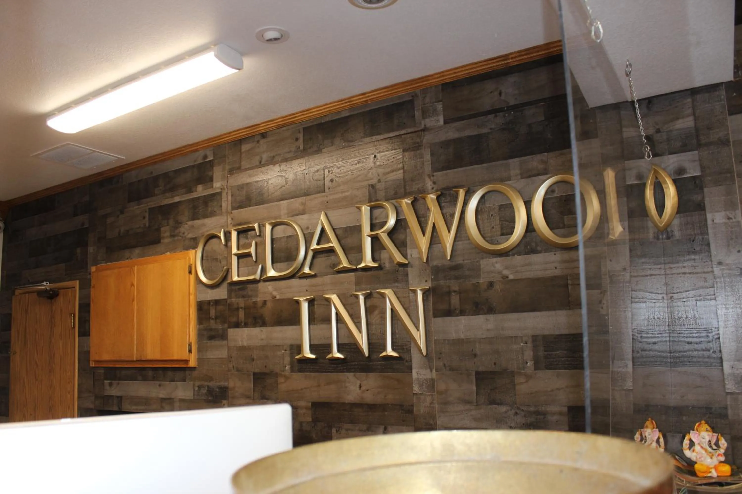 Property logo or sign in Cedarwood Inn of Ashland