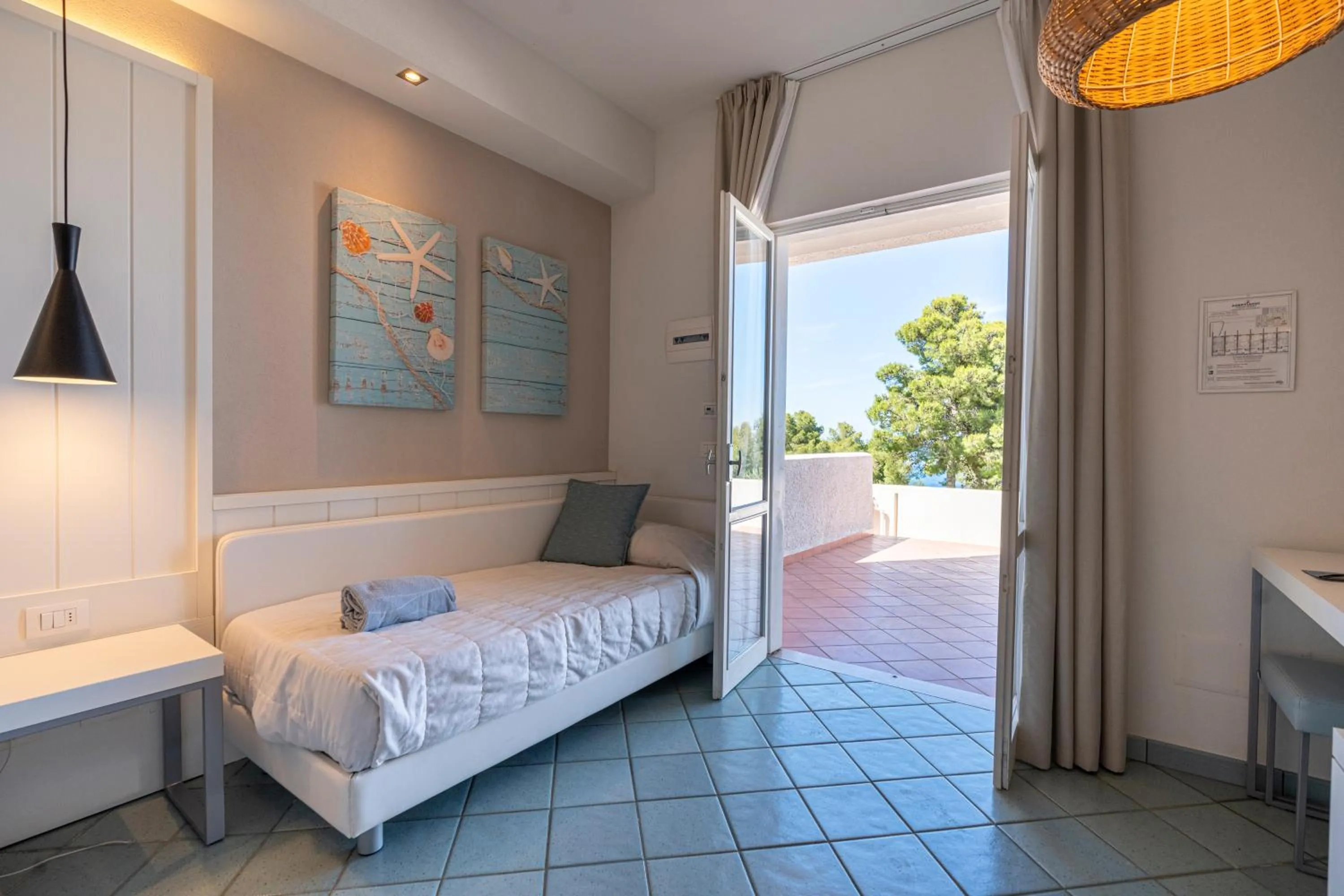 Bed in Mangia's Pollina Resort