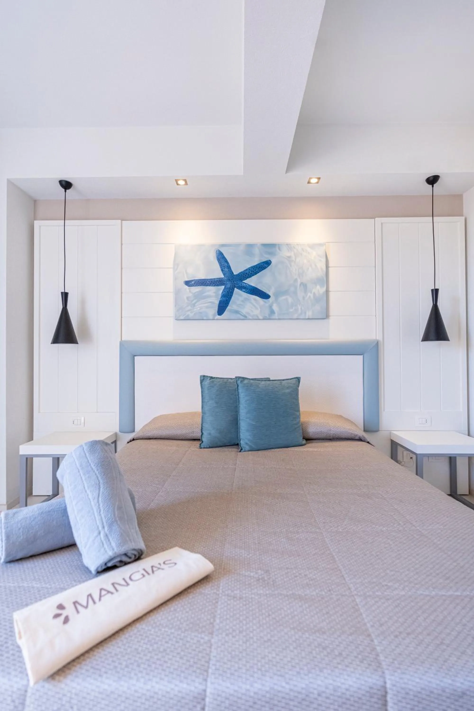 Bed in Mangia's Pollina Resort