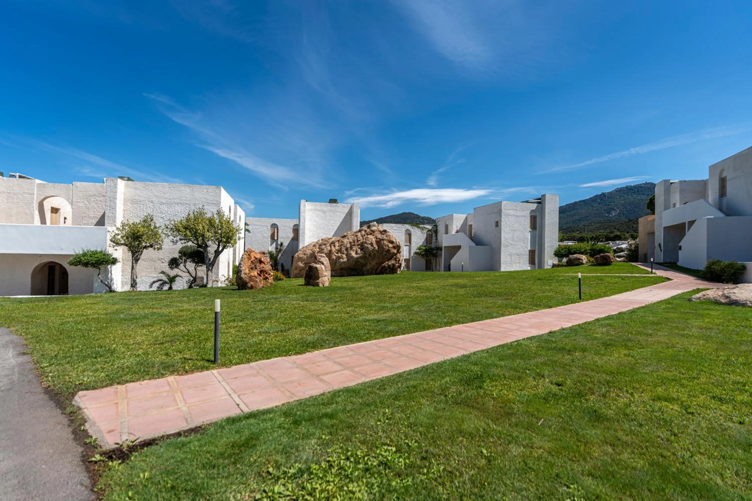 Property building in Mangia's Pollina Resort