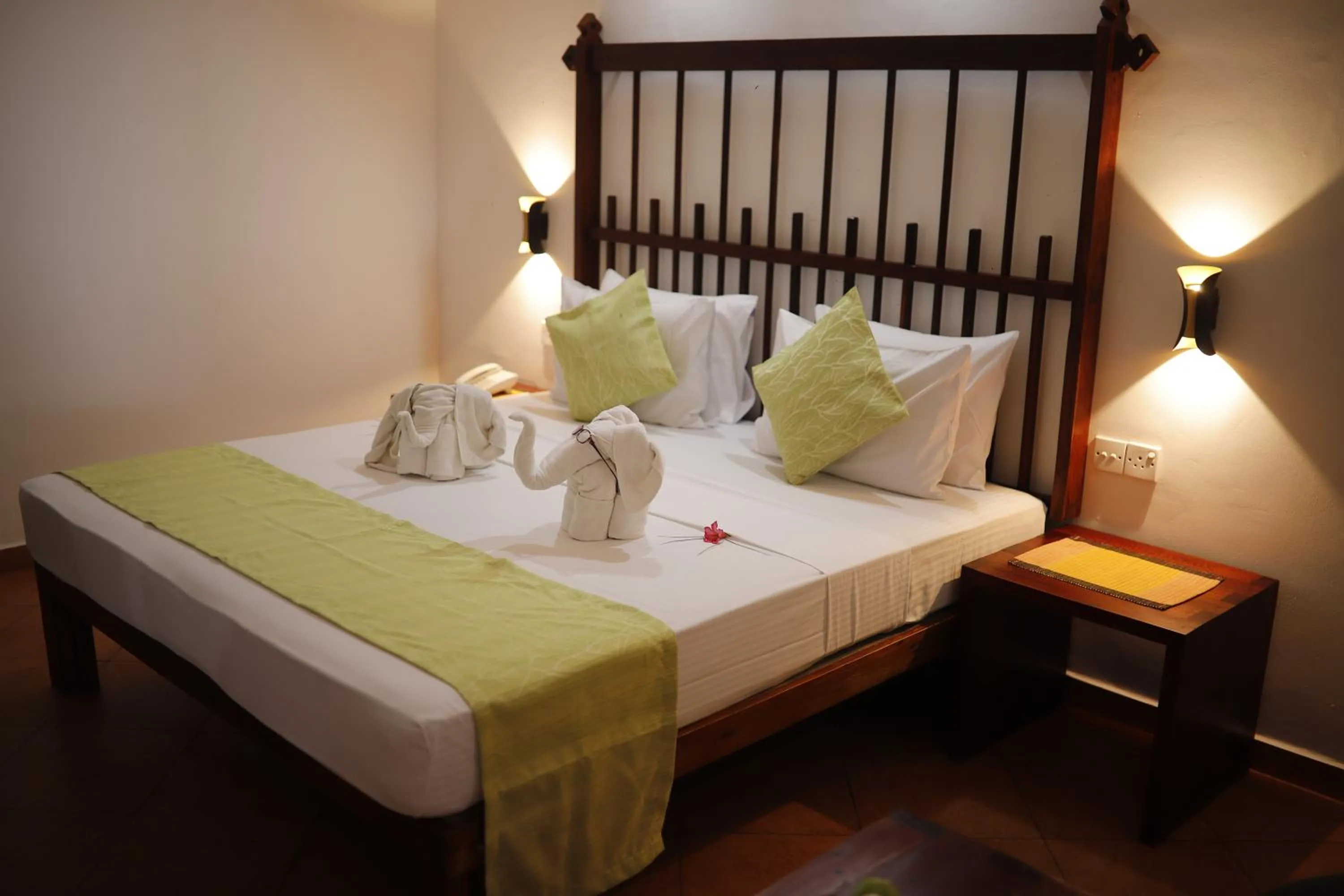 Bed in The Long Beach Resort & Spa