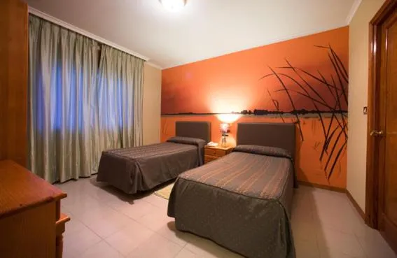 Photo of the whole room, Bed in Hostal Restaurante Terra Chá