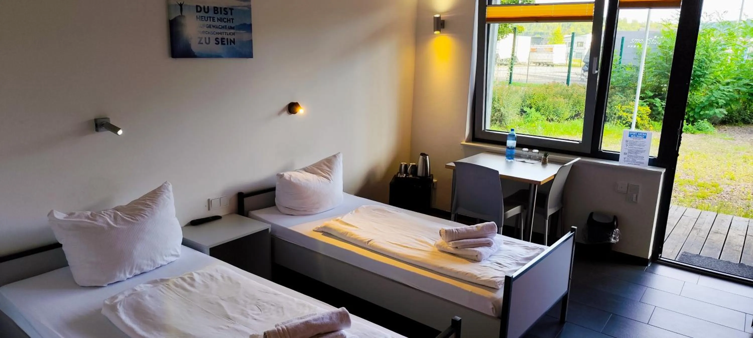 Photo of the whole room, Bed in Arena Hotel Waldshut