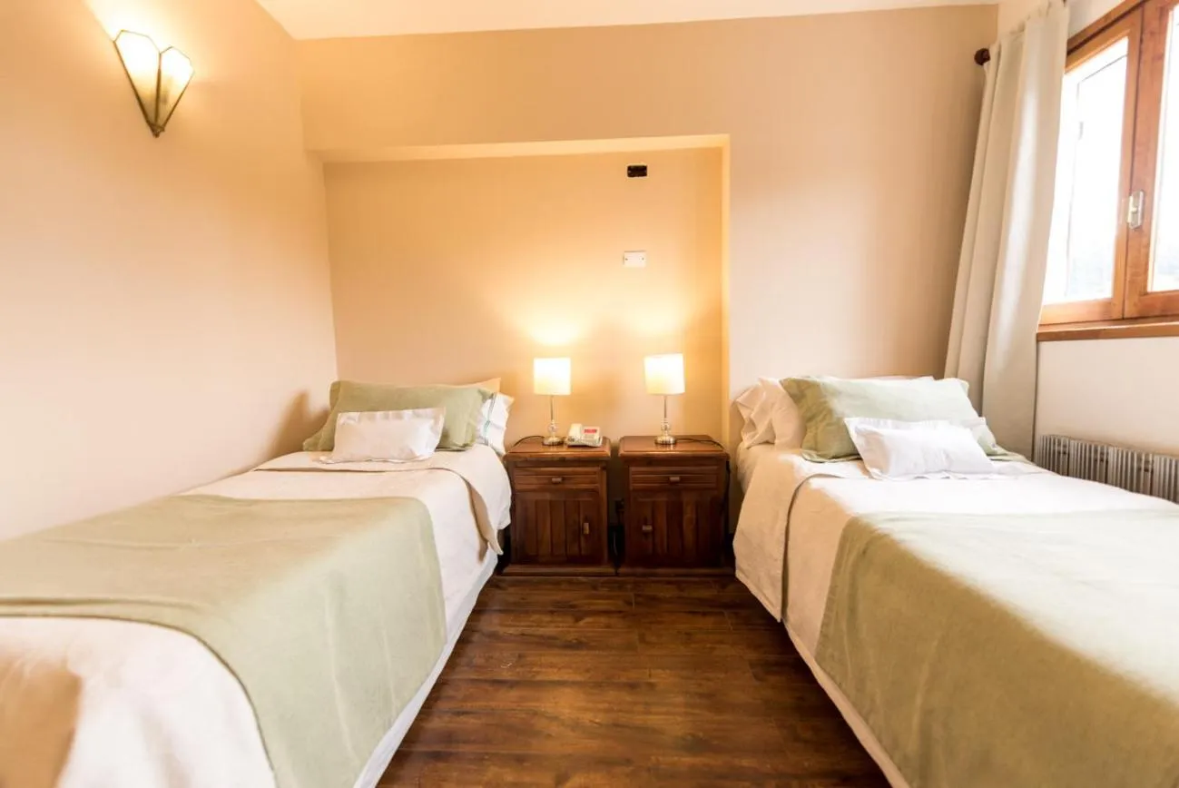 Photo of the whole room, Bed in Tunqueley Hotel