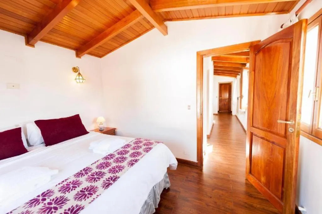 Photo of the whole room, Bed in Tunqueley Hotel