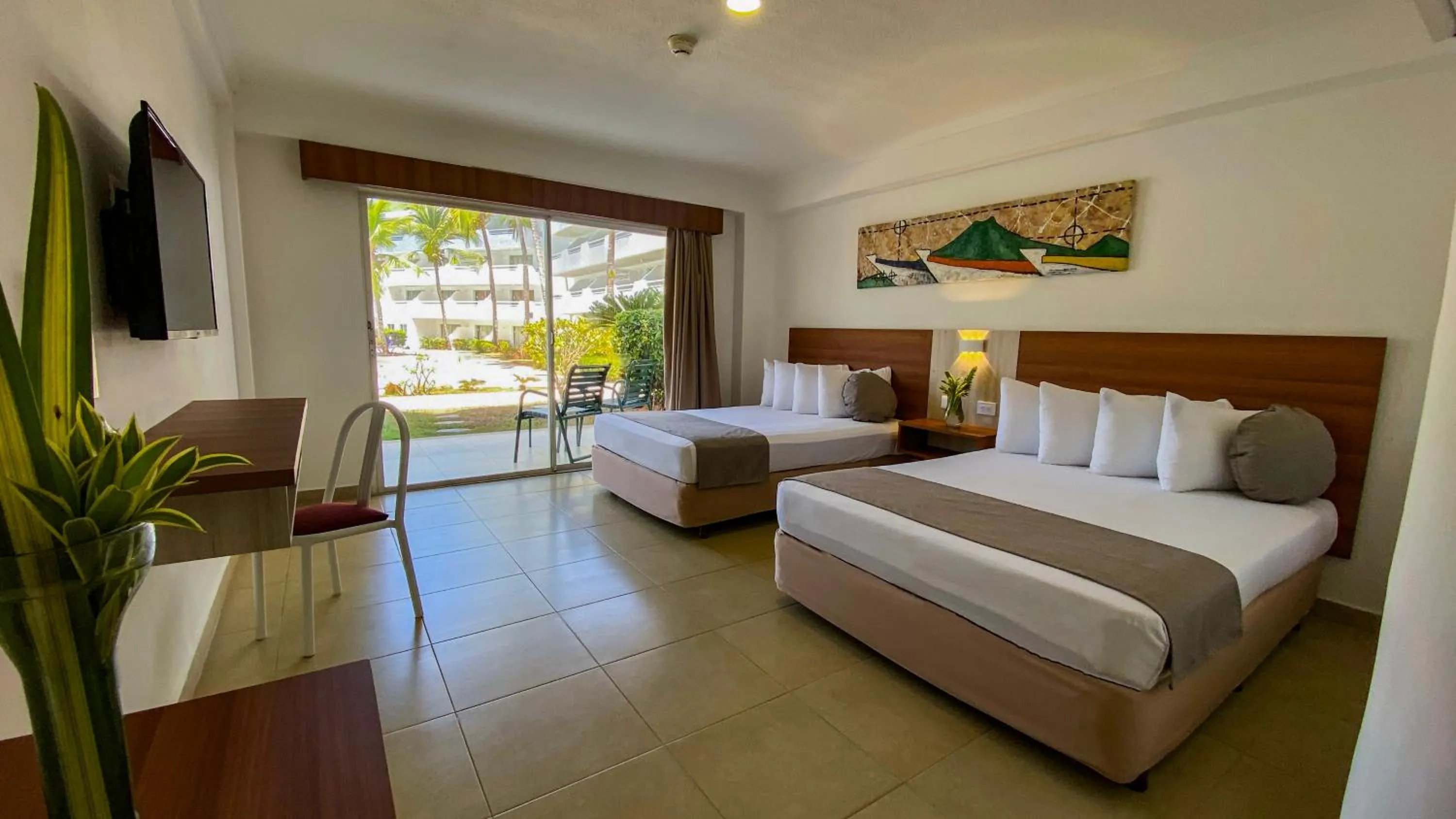 Photo of the whole room, Bed in Sunsol Isla Caribe