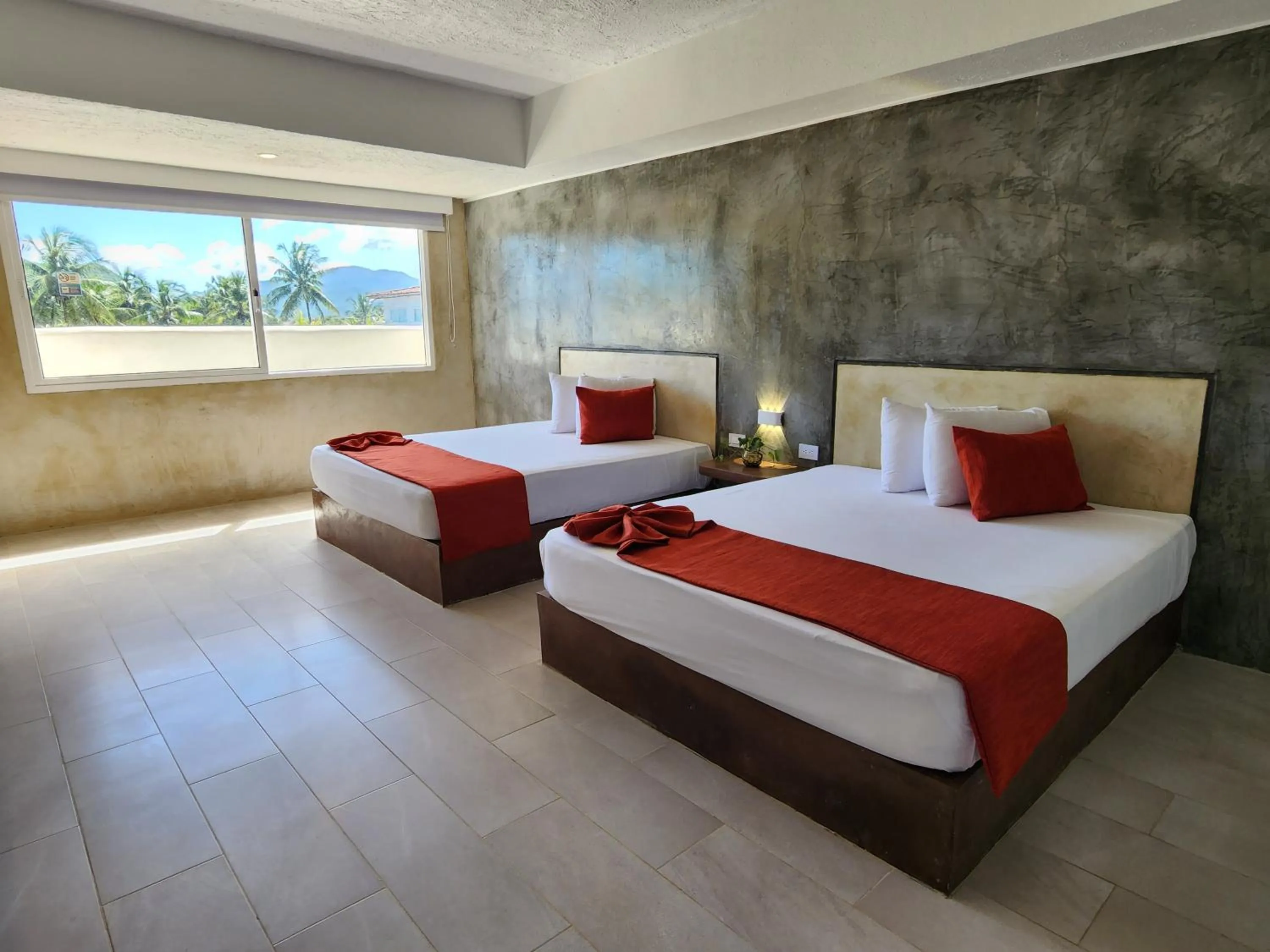 Photo of the whole room, Bed in Sunsol Isla Caribe