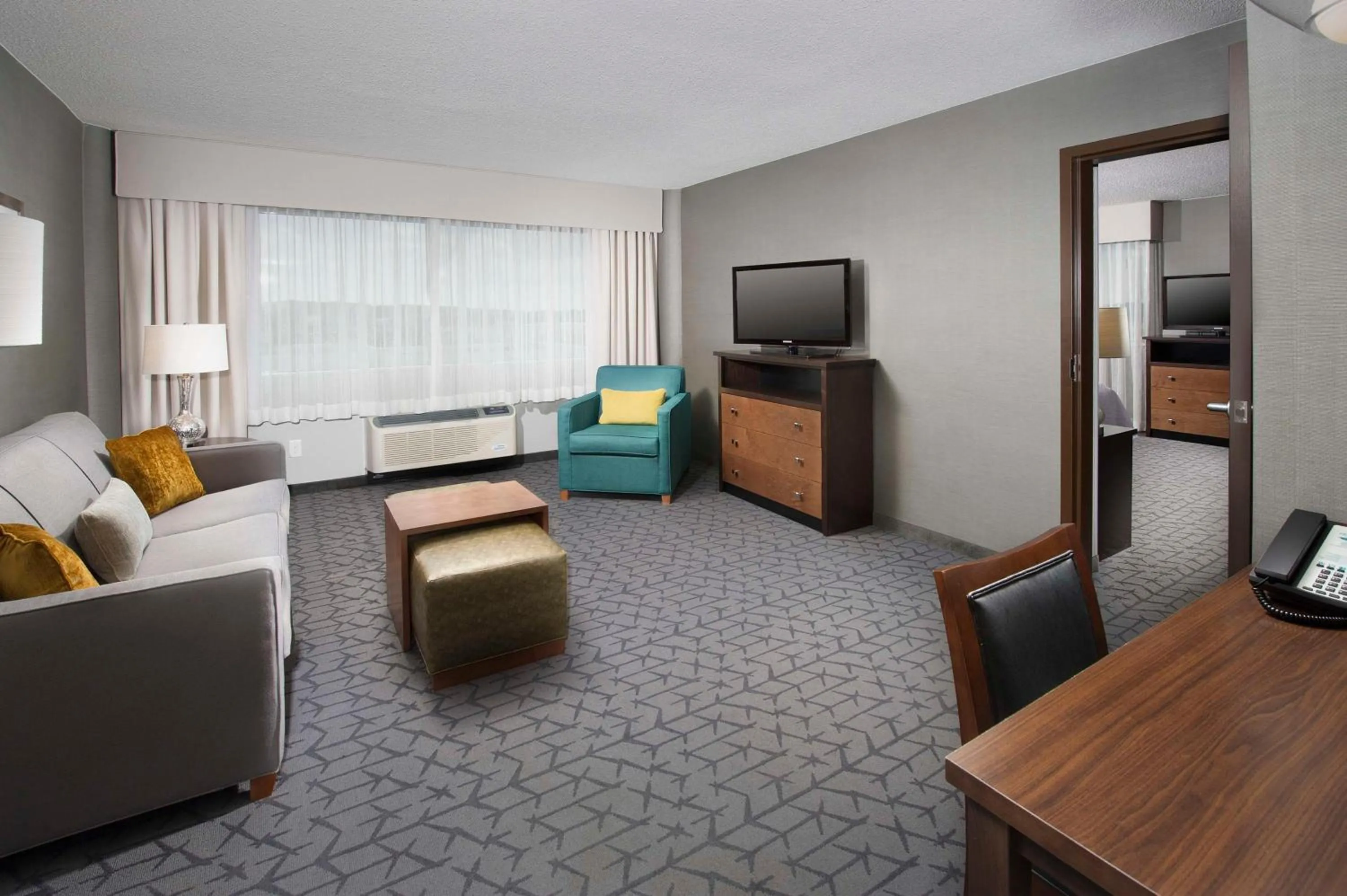Living room, Bed in Homewood Suites by Hilton Gaithersburg/Washington, DC North