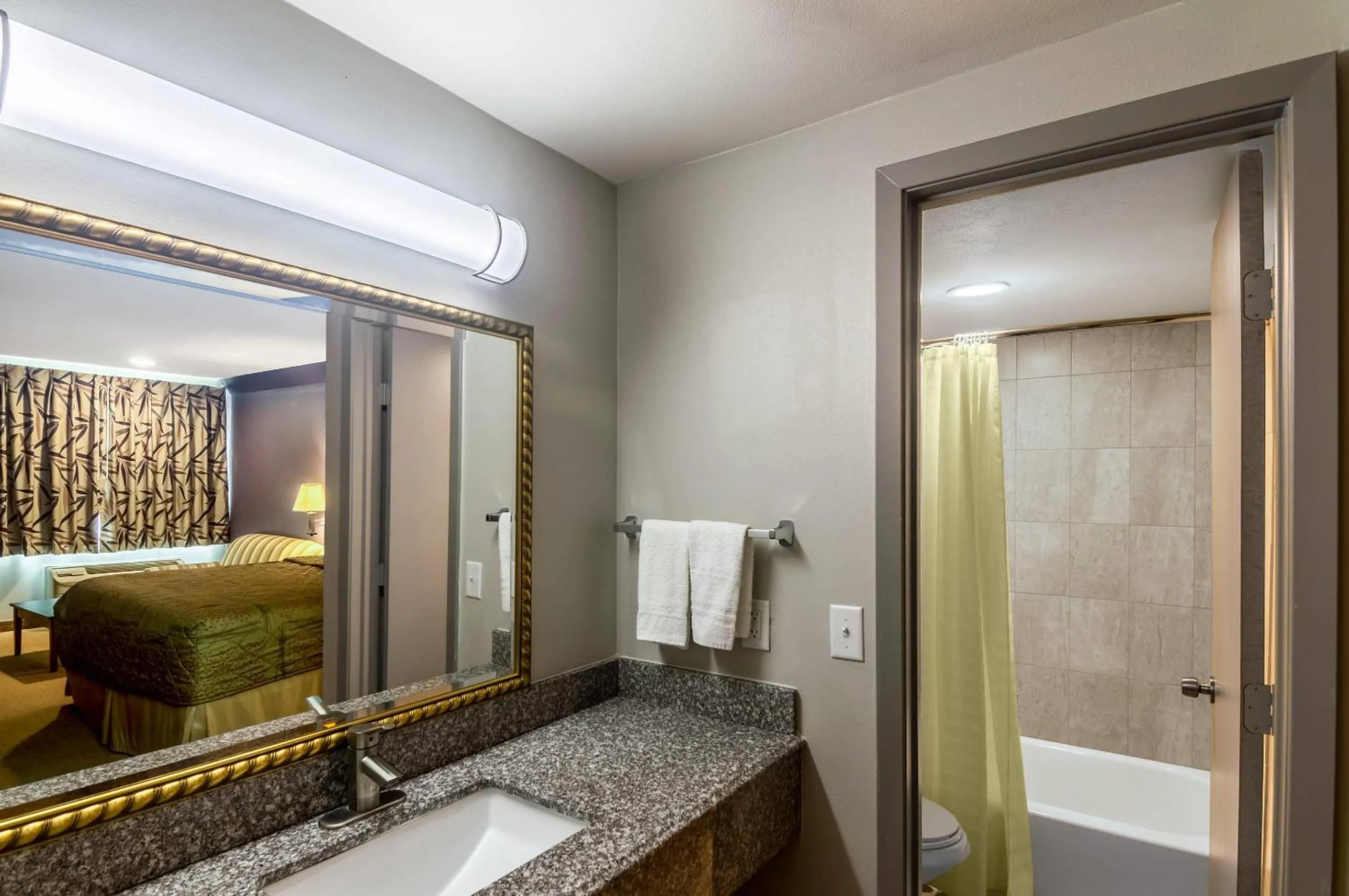 Bedroom, Bed in Rodeway Inn Arlington Entertainment District Area