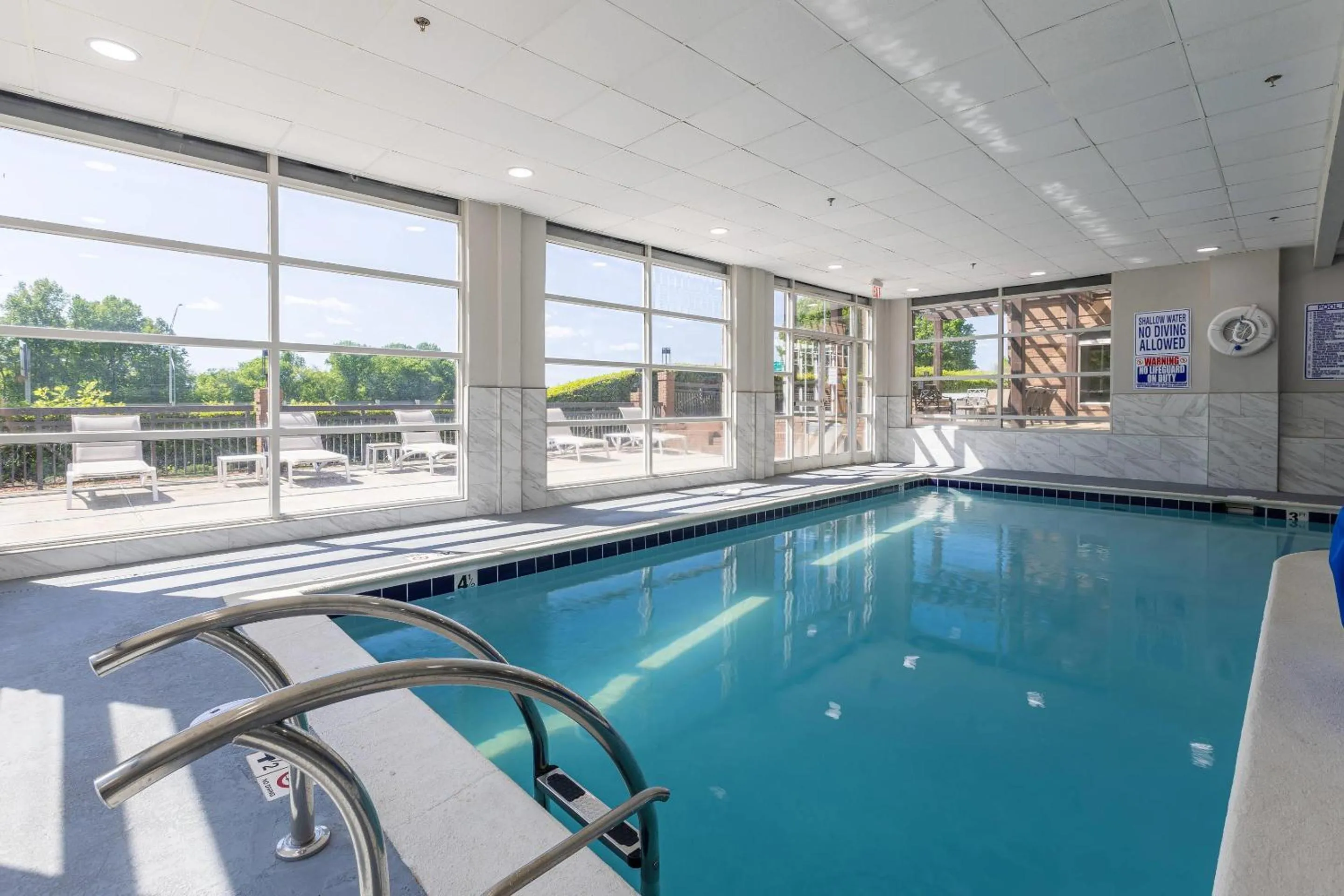 Swimming pool in Country Inn & Suites by Radisson, Lake Norman Huntersville, NC
