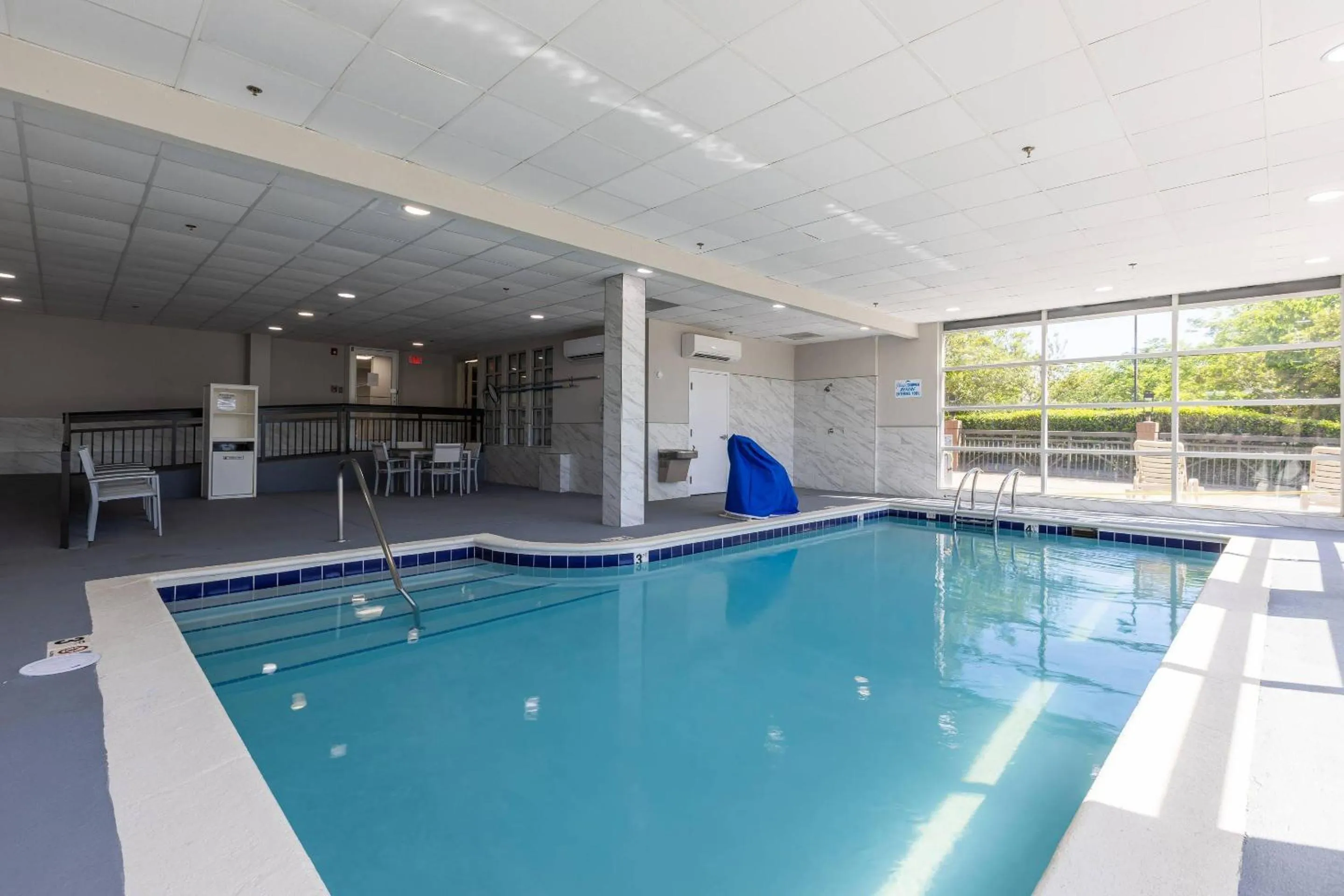 Swimming pool in Country Inn & Suites by Radisson, Lake Norman Huntersville, NC