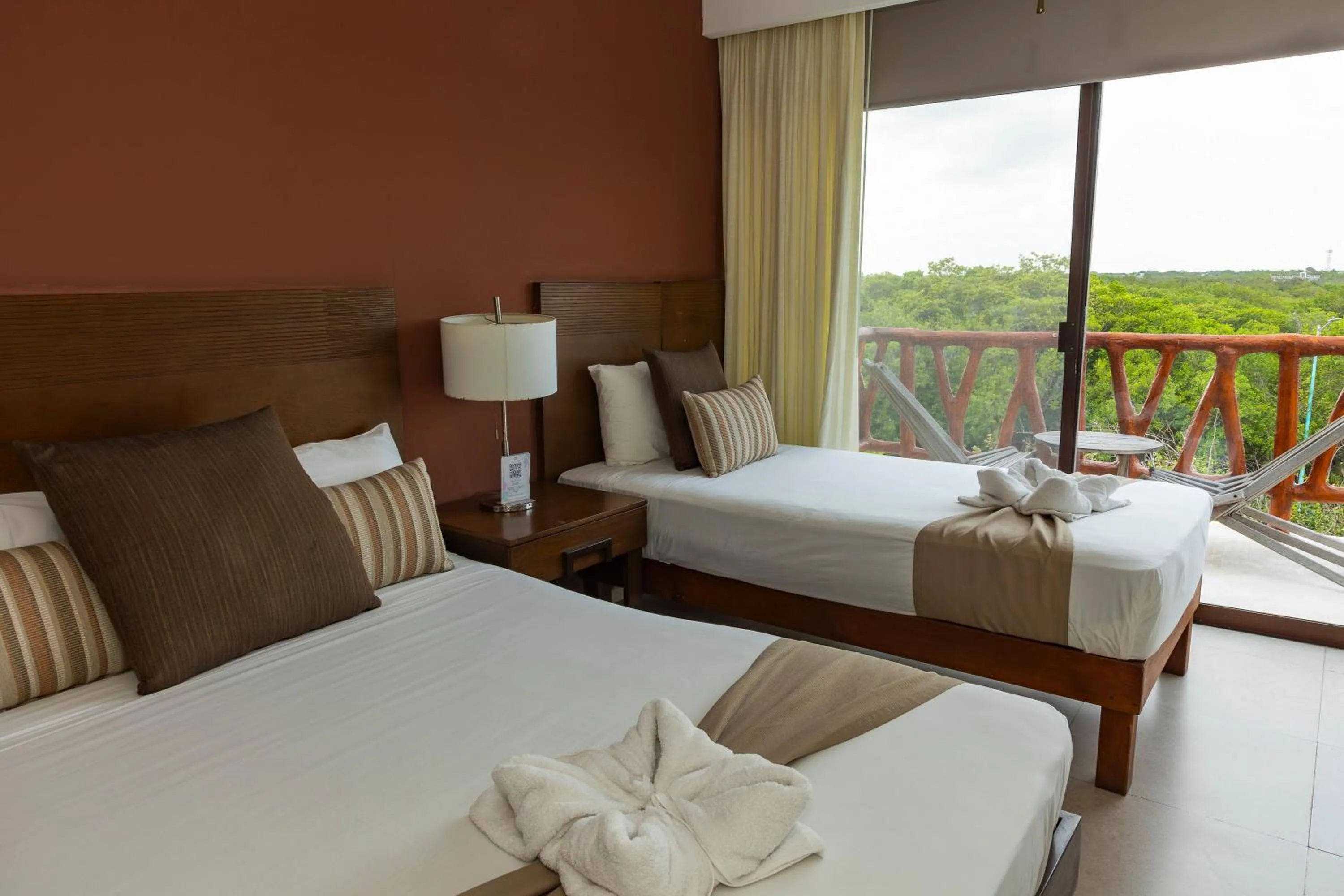 Balcony/Terrace, Bed in Quinto Sole Boutique Hotel Mahahual