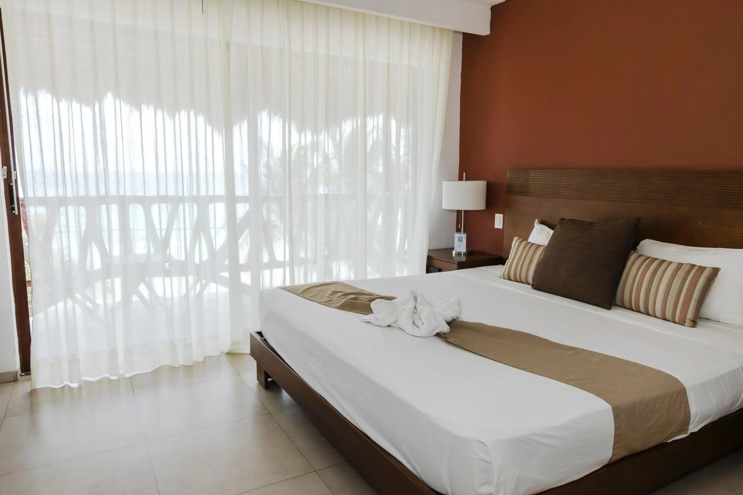 Bed in Quinto Sole Boutique Hotel Mahahual