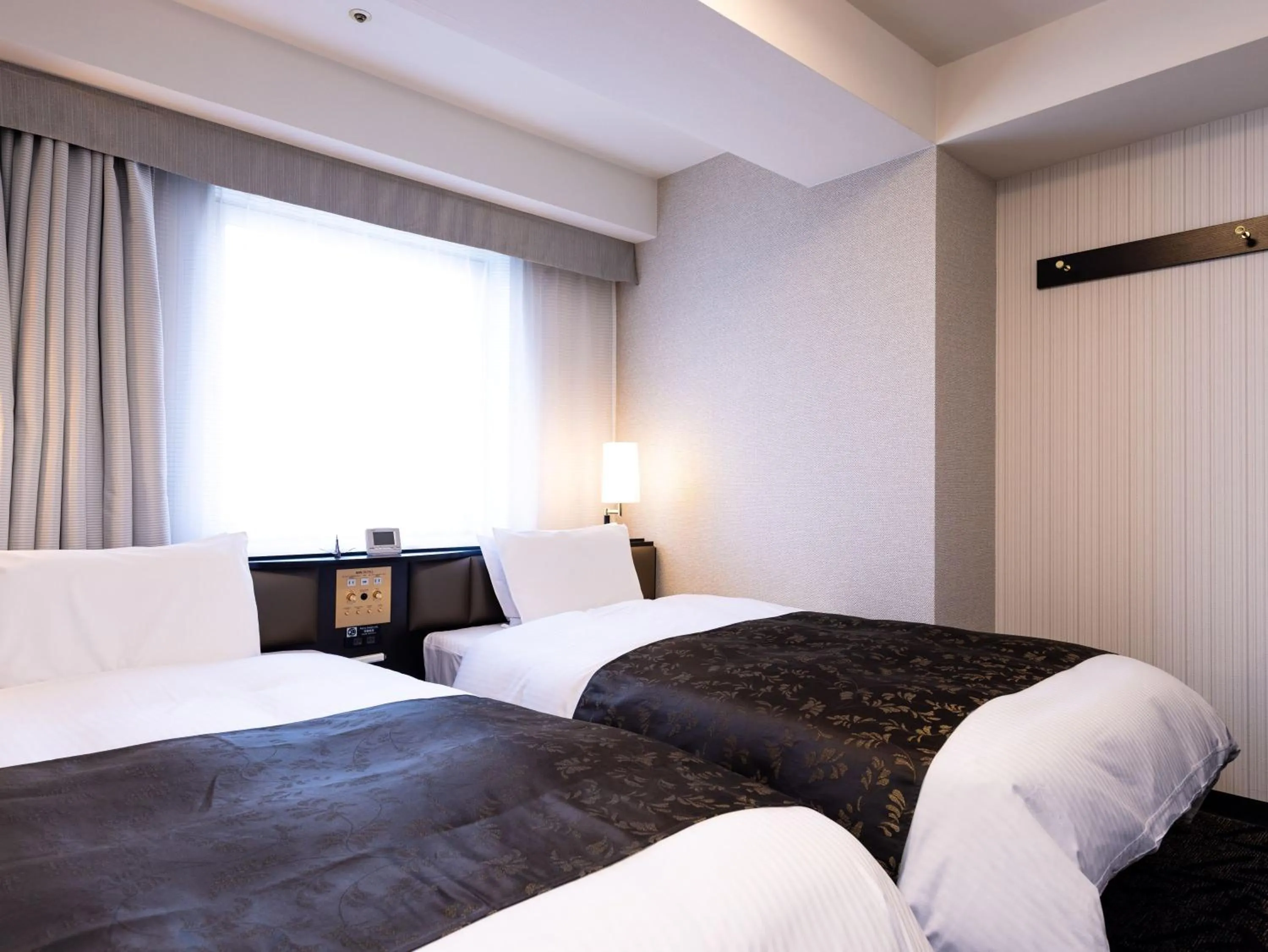 Photo of the whole room, Bed in APA Hotel Fukui Katamachi