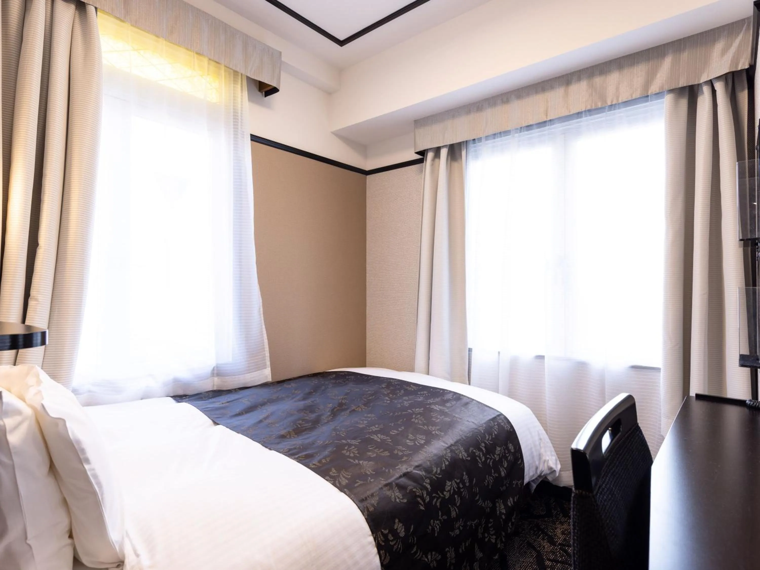 Photo of the whole room, Bed in APA Hotel Fukui Katamachi
