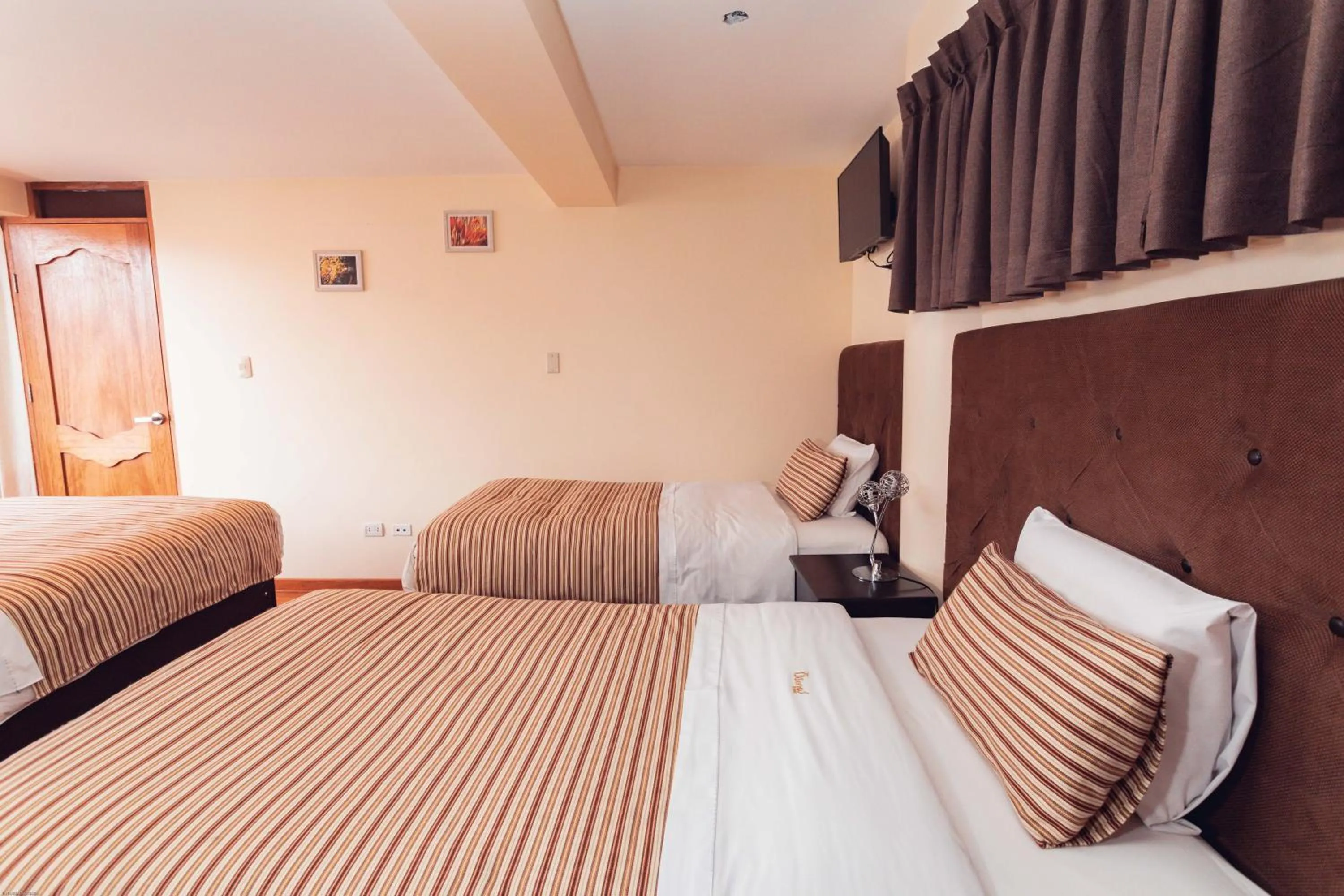 Bed in Hotel Las Quenas