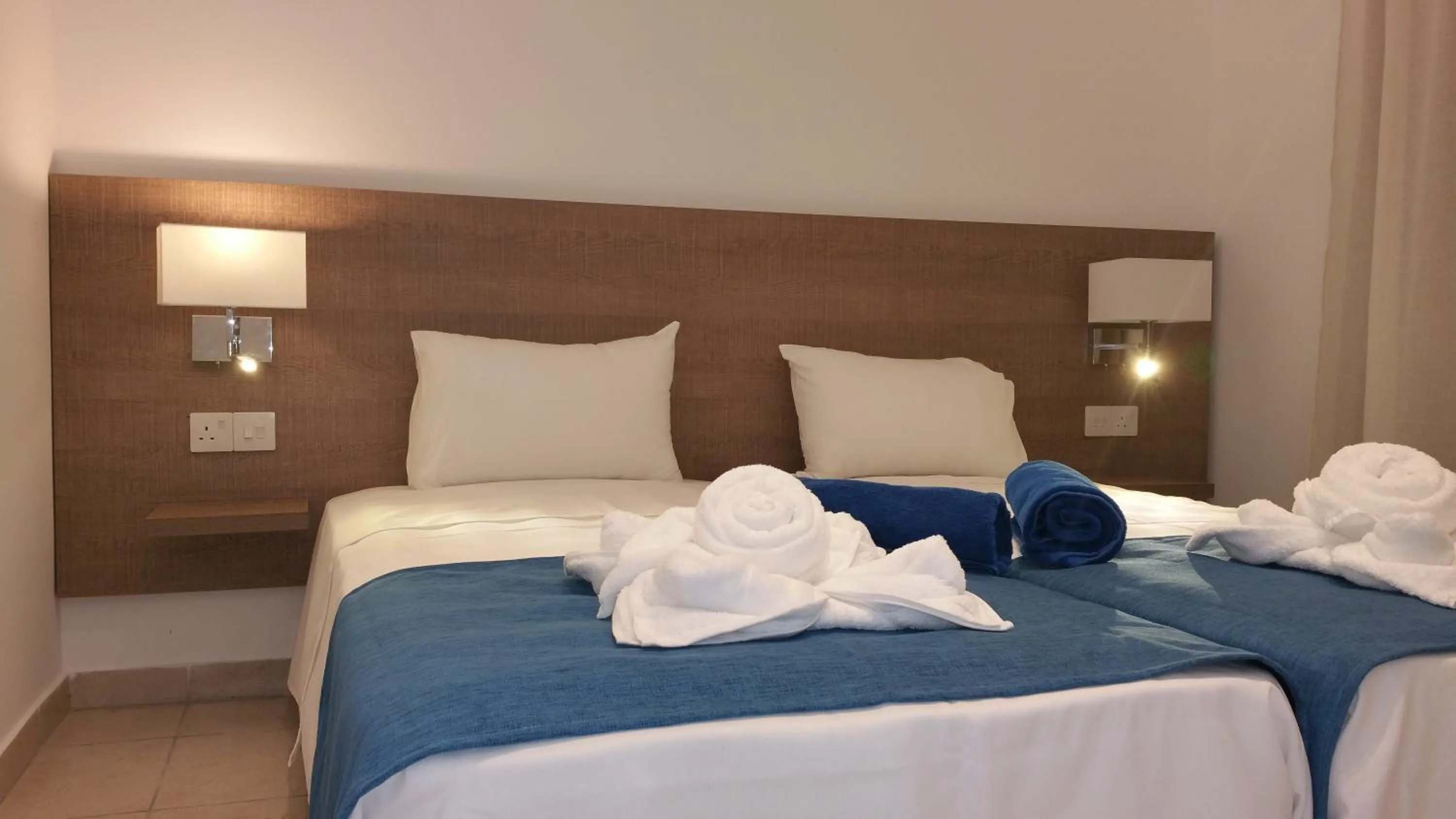 Bed in Marica's Boutique Hotel