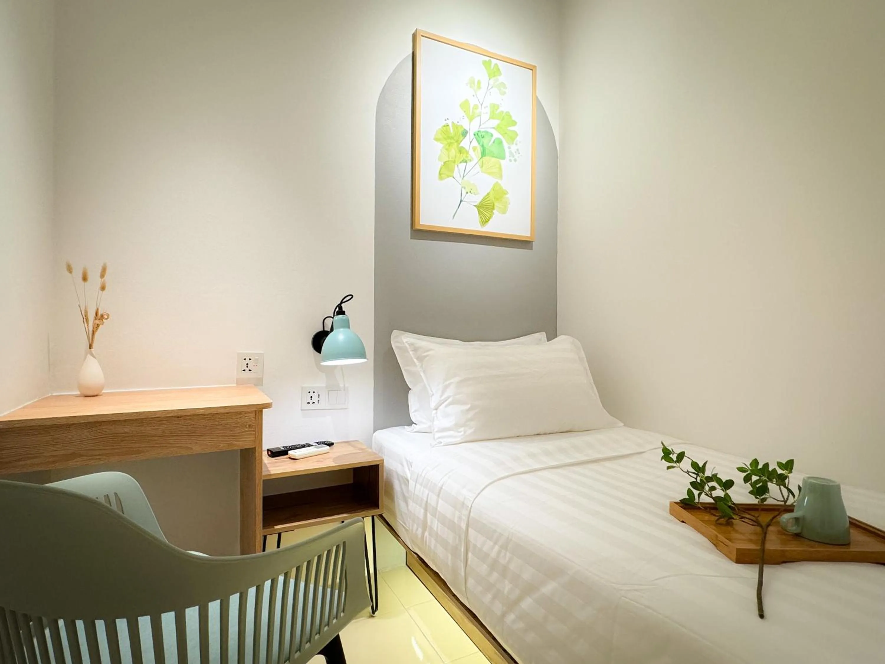 Bed in Apple 1 Hotel Queensbay