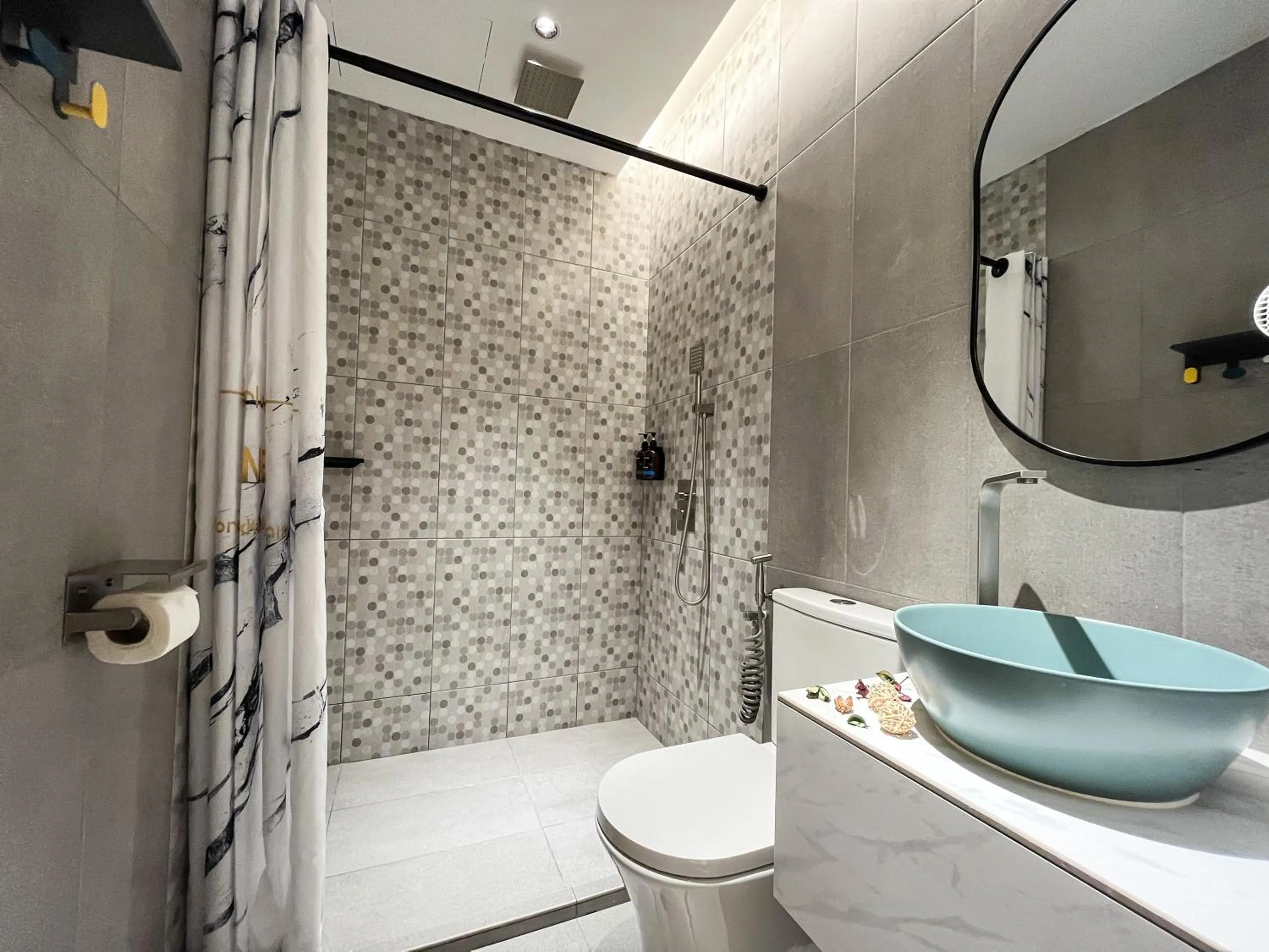 Bathroom in Apple 1 Hotel Queensbay