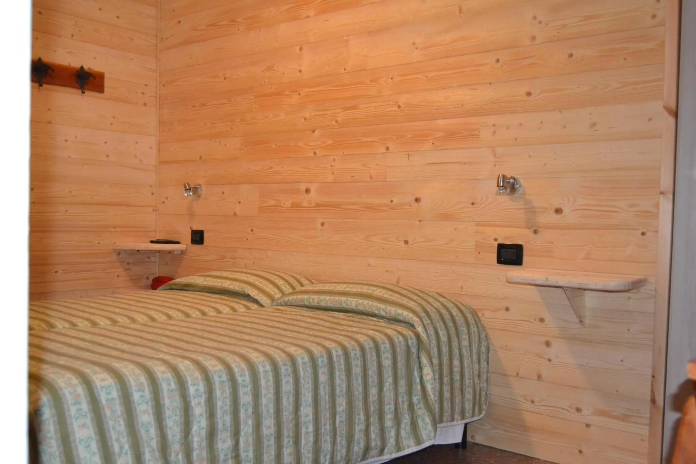 Bed in Albergo Cioccarelli