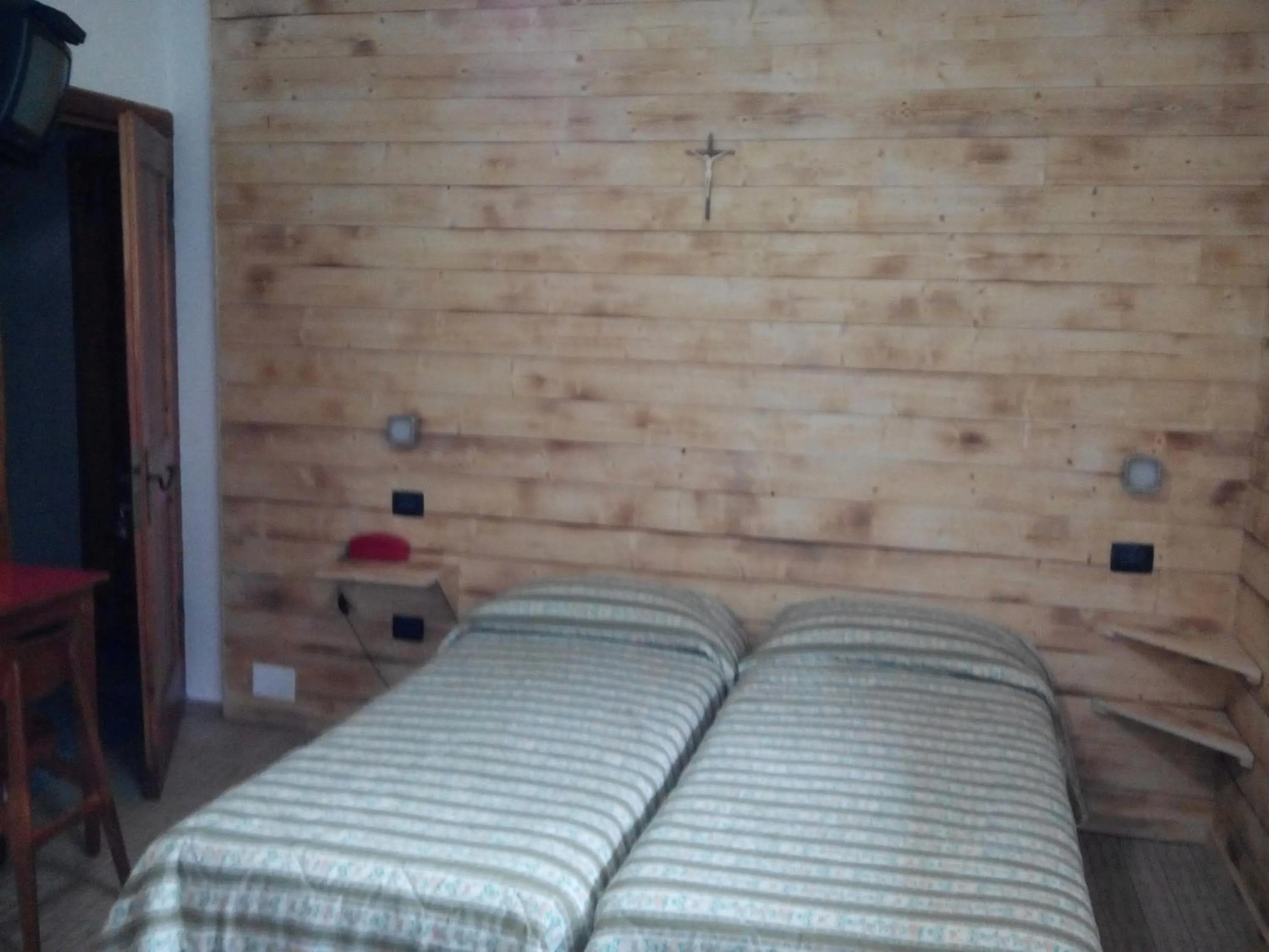 Bed in Albergo Cioccarelli