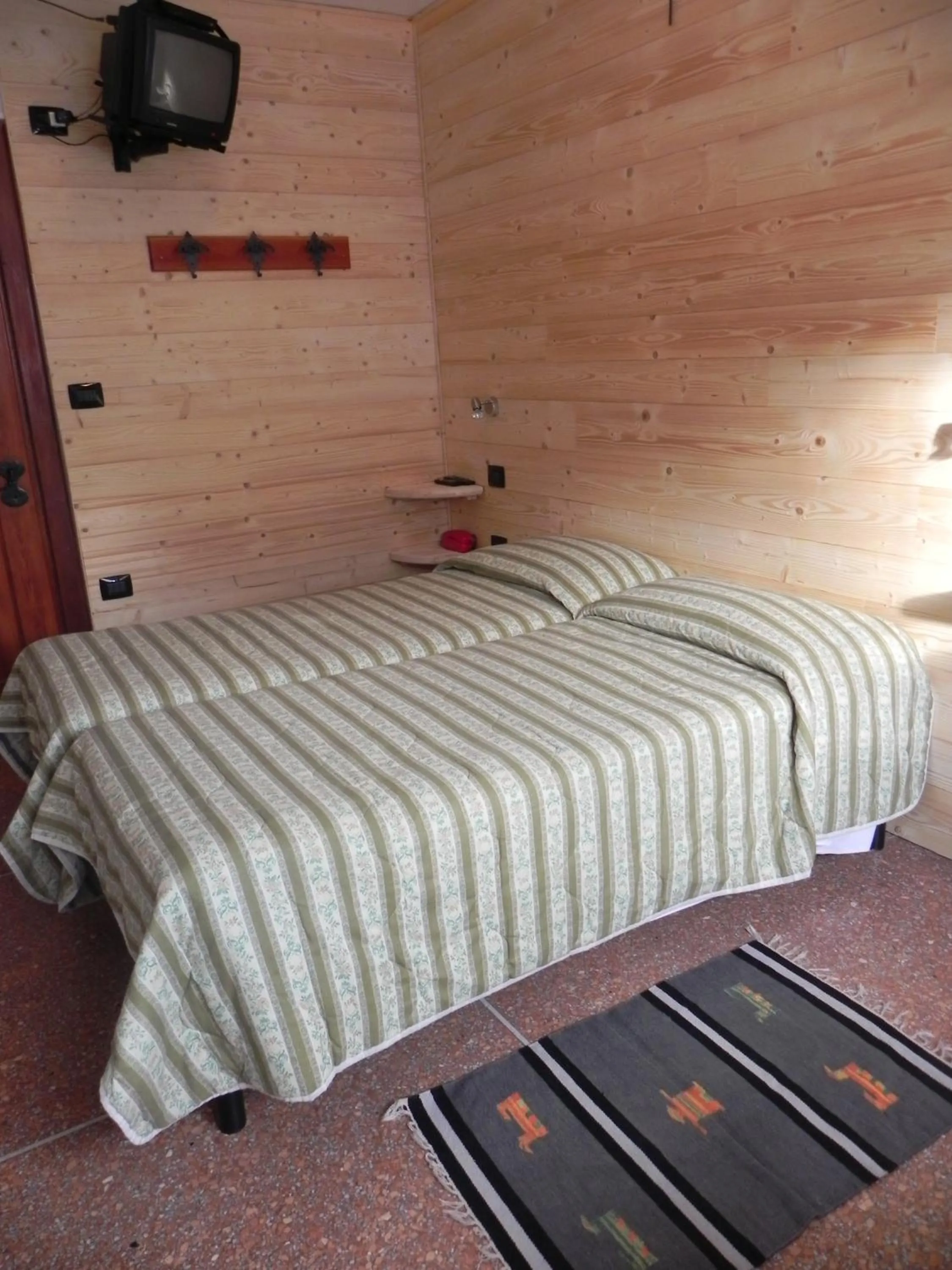 Bed in Albergo Cioccarelli