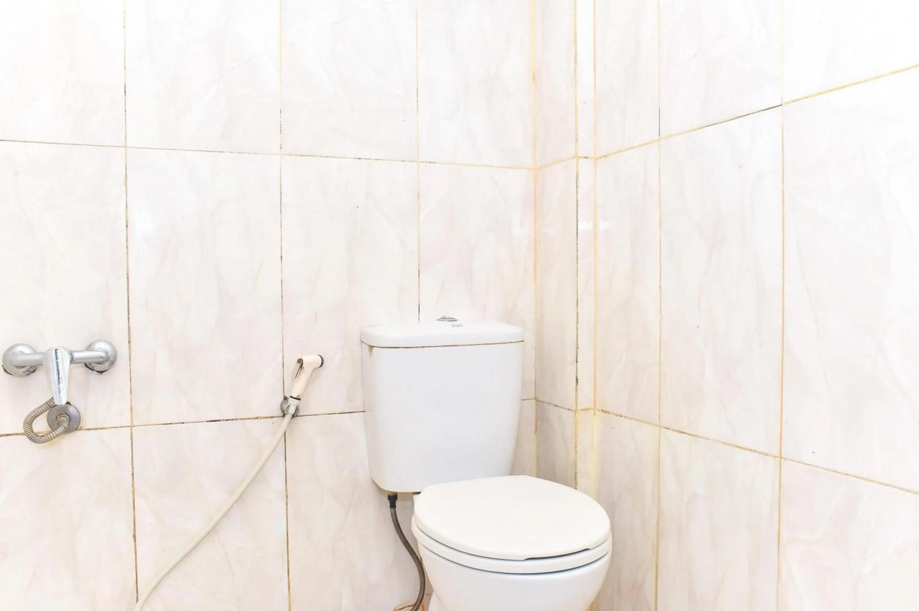 Bathroom in Reddoorz Plus near Makassar Town Square