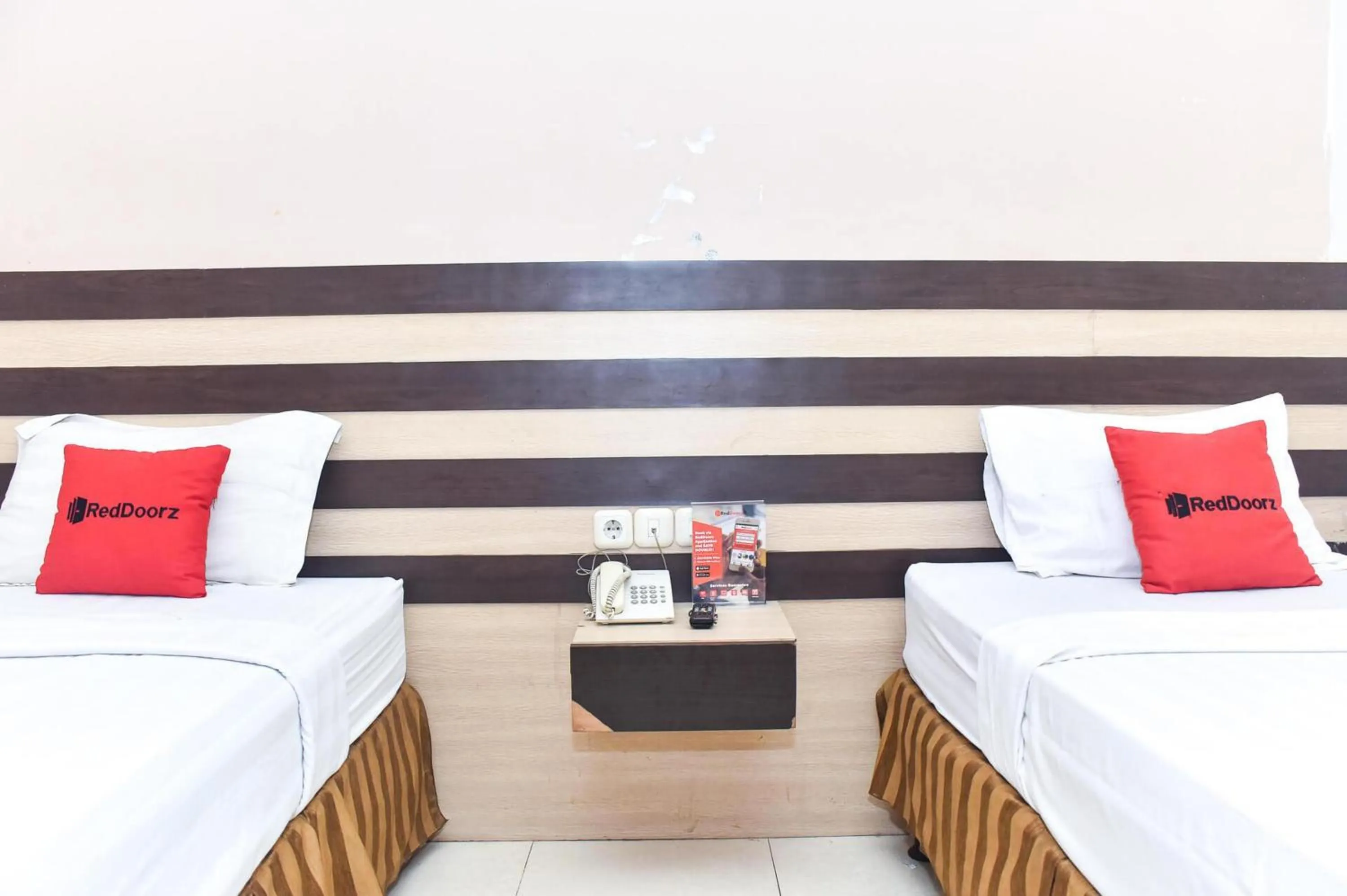 Bedroom, Bed in Reddoorz Plus near Makassar Town Square