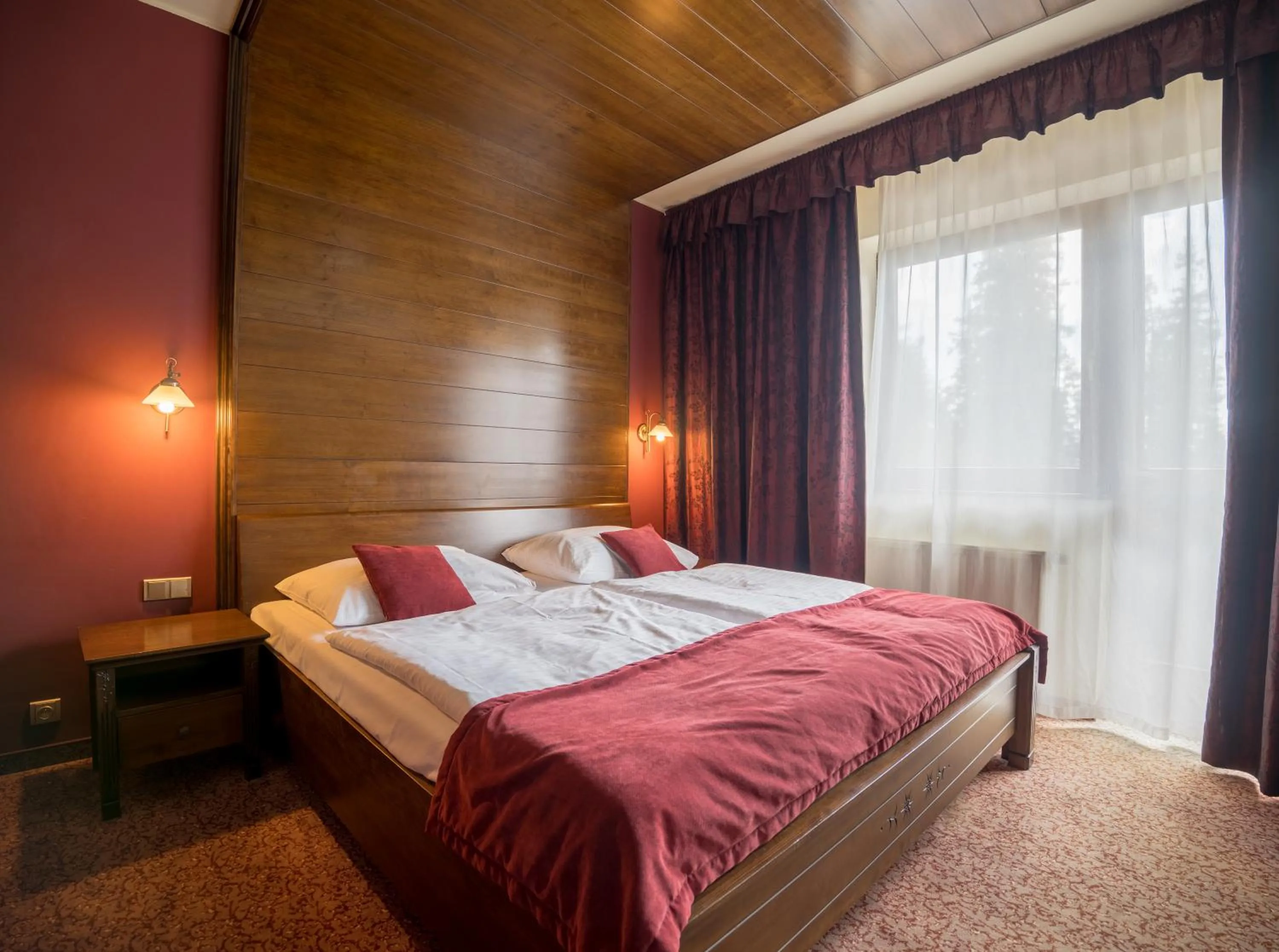 Photo of the whole room, Bed in APLEND Wellness Hotel Borovica