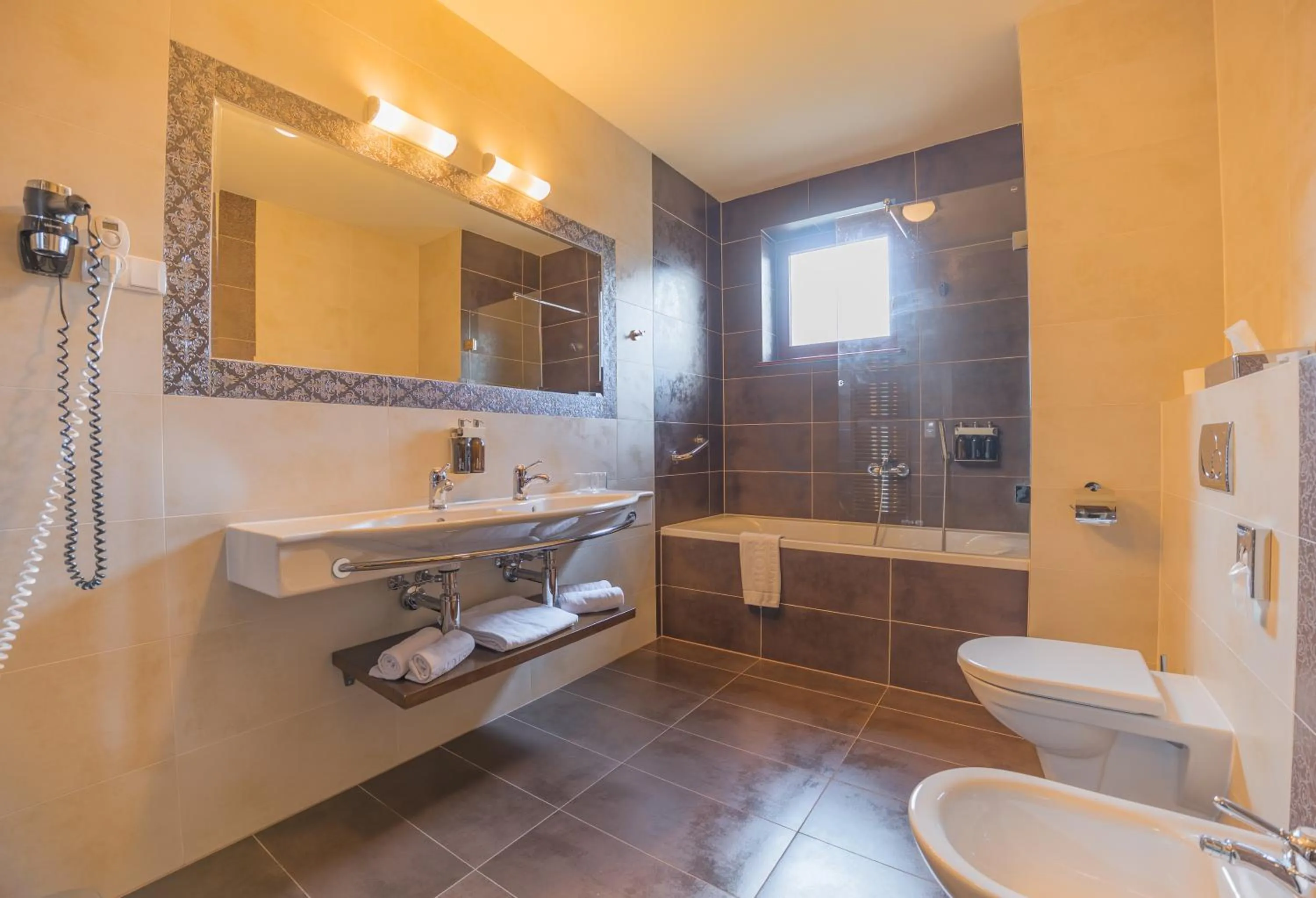 Bathroom in APLEND Wellness Hotel Borovica