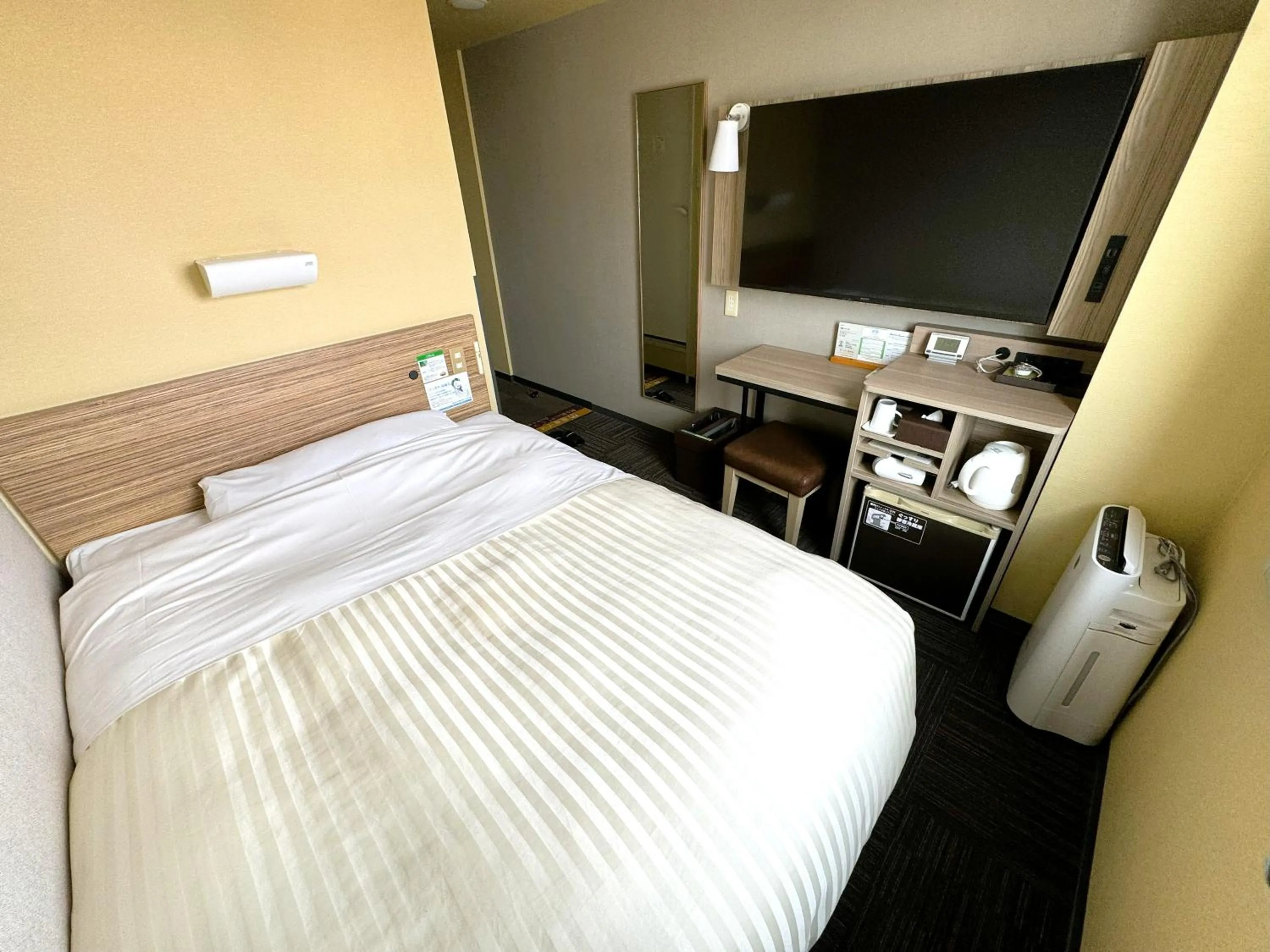 Bed in Super Hotel Hirosaki