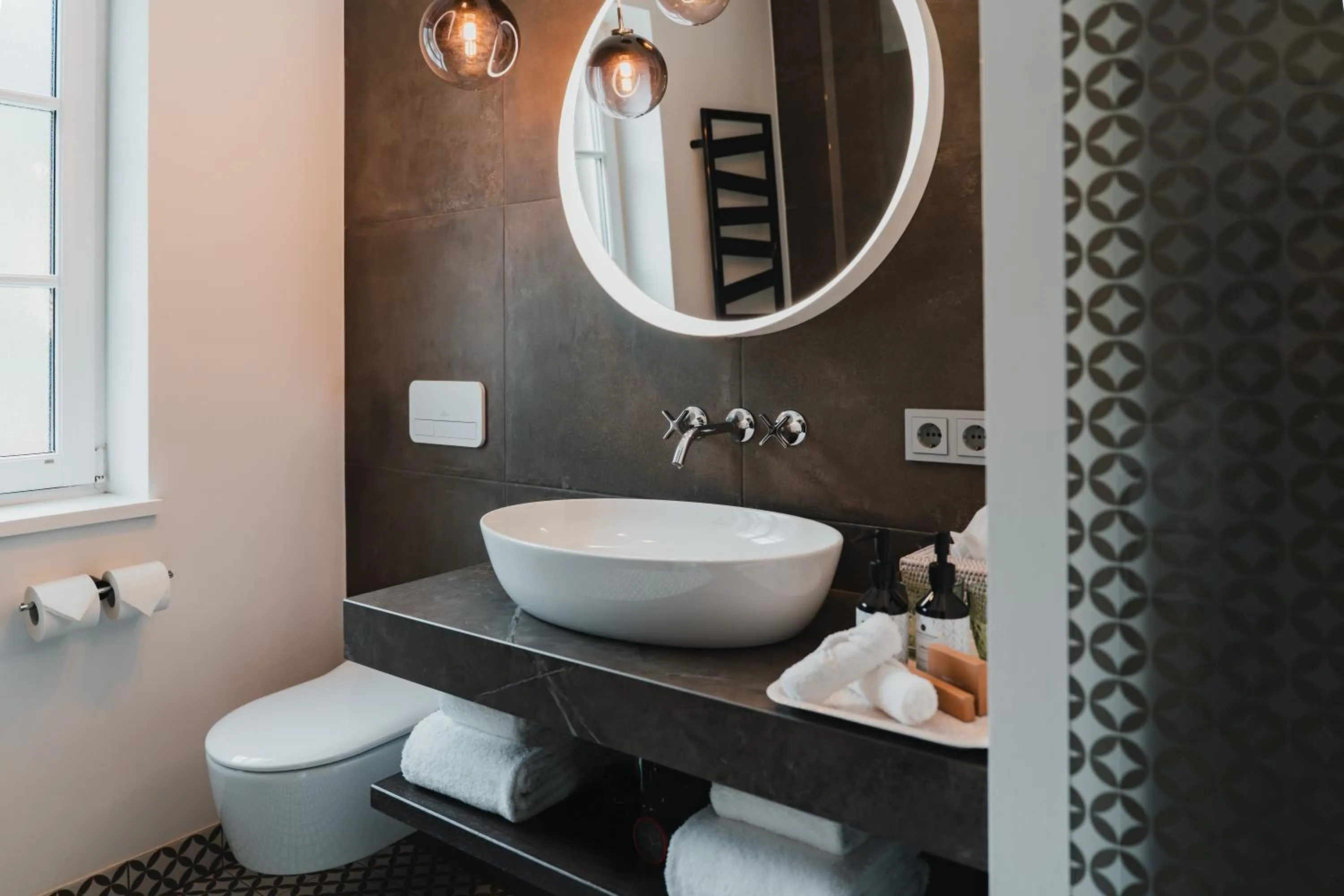 Bathroom in TAUROA Seehotel Grundlsee