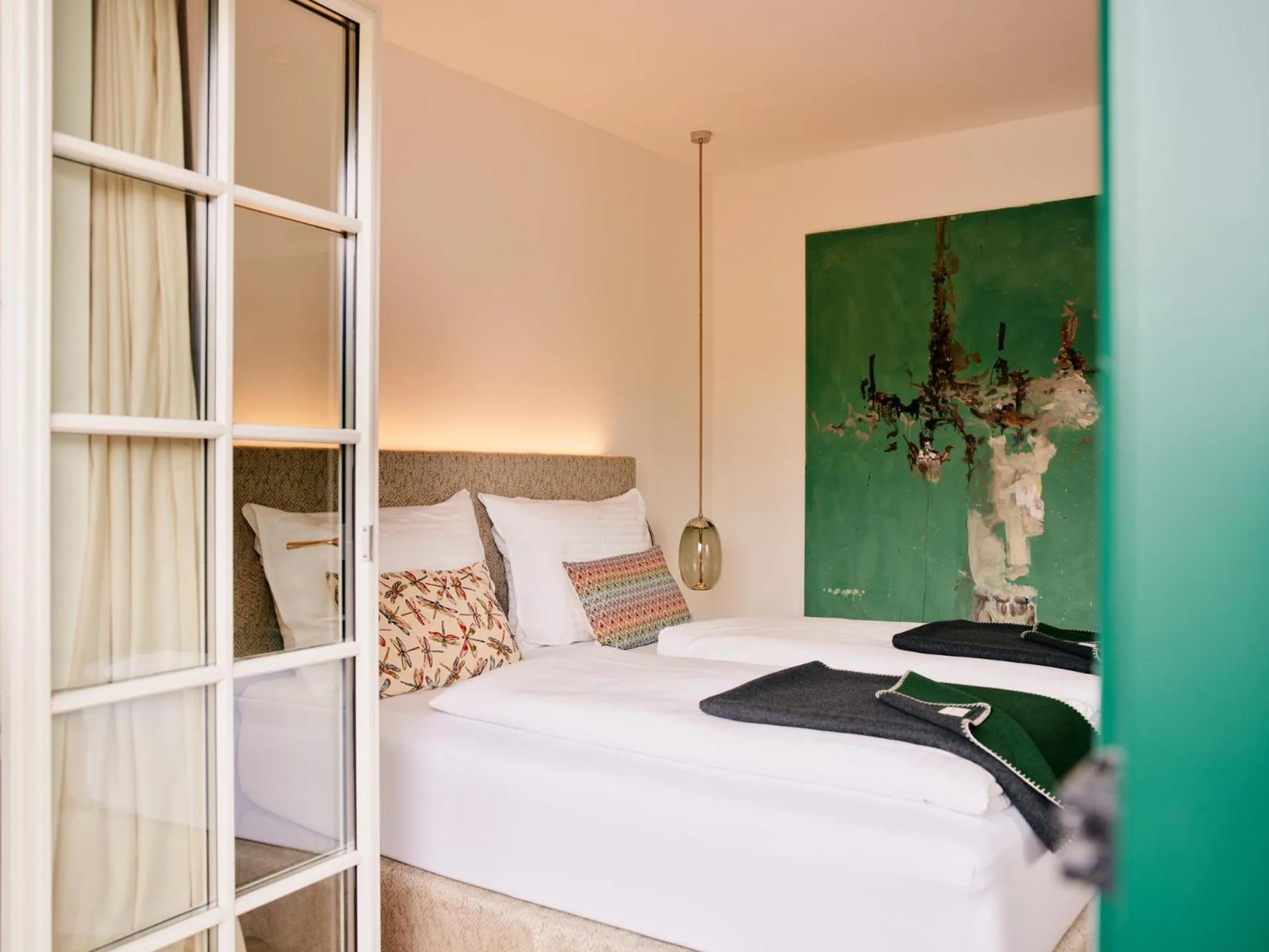 Bed in TAUROA Seehotel Grundlsee