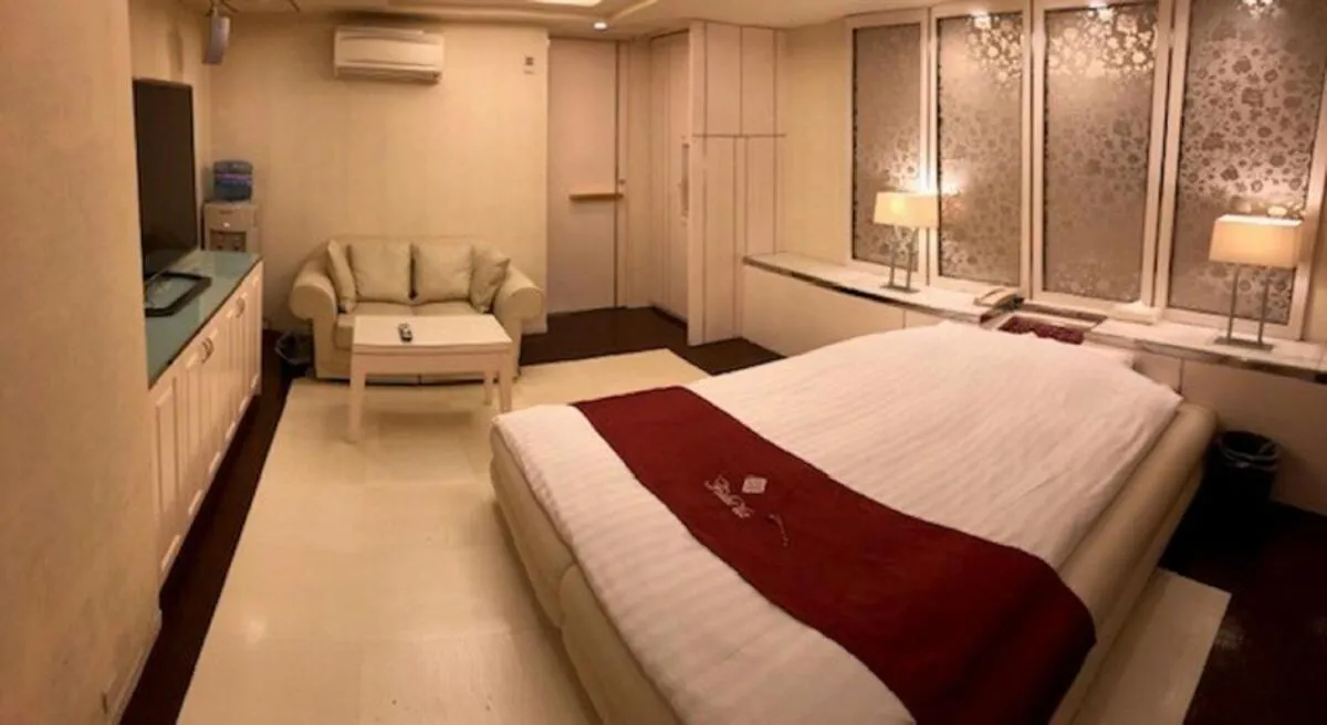 Bed in Prime Hotel Fulula プライムホテル フルーラ