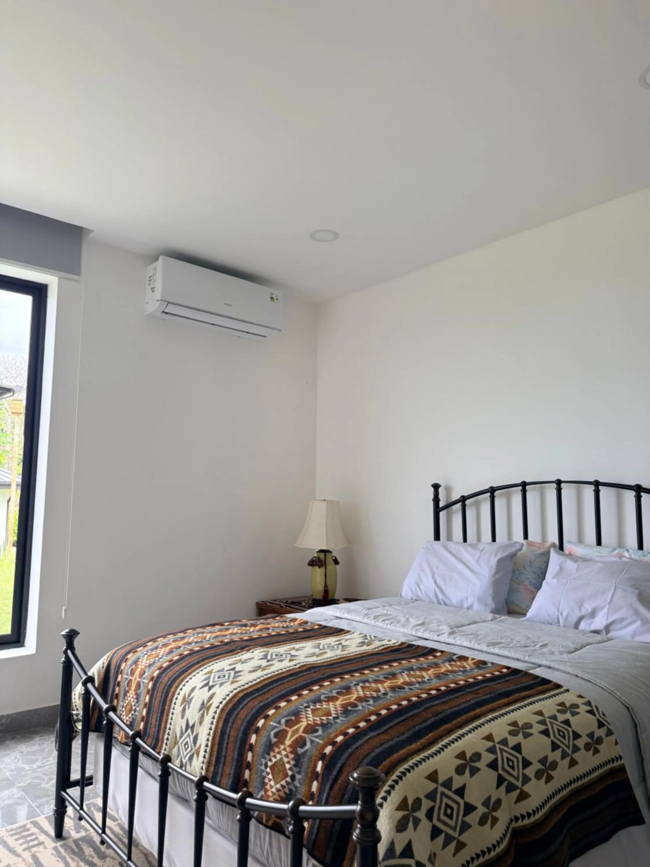 Bed in Samai Lodge Holistic Living