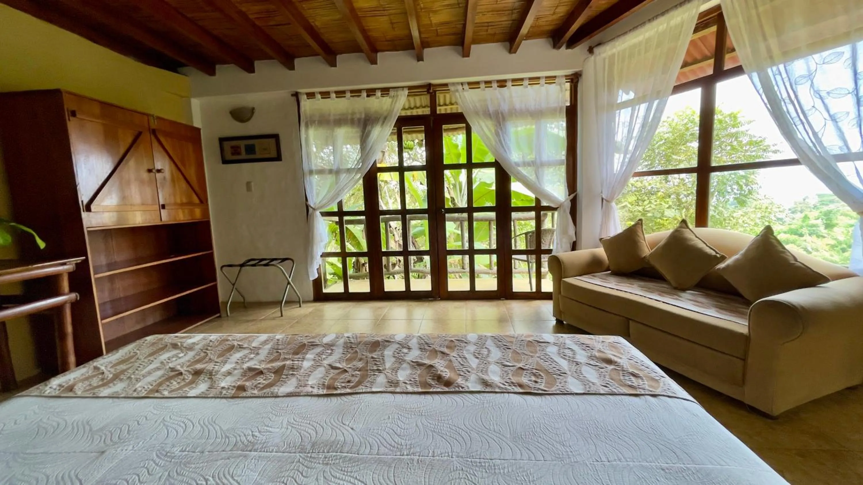 Bed in Samai Lodge Holistic Living
