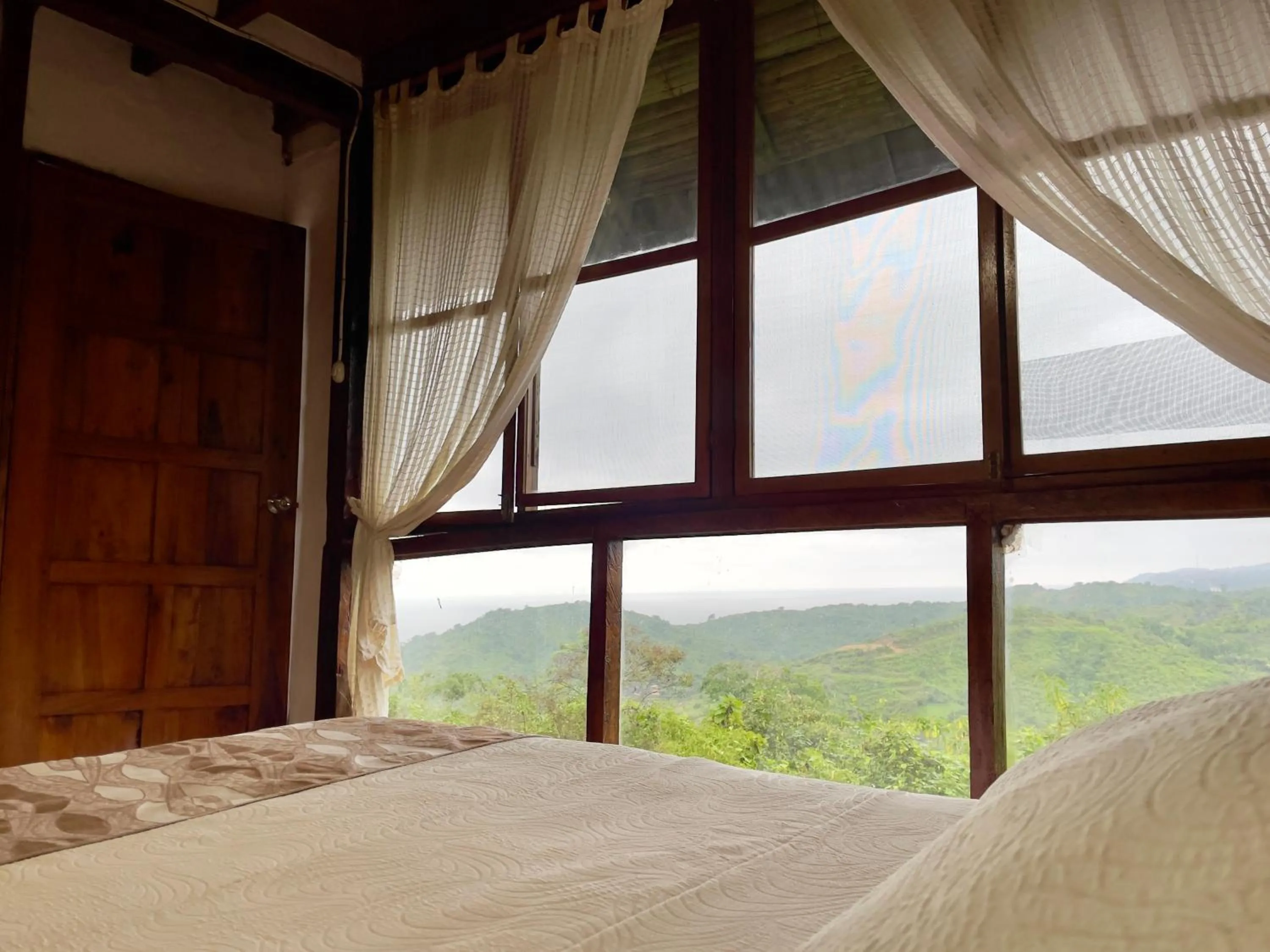 View (from property/room), Bed in Samai Lodge Holistic Living