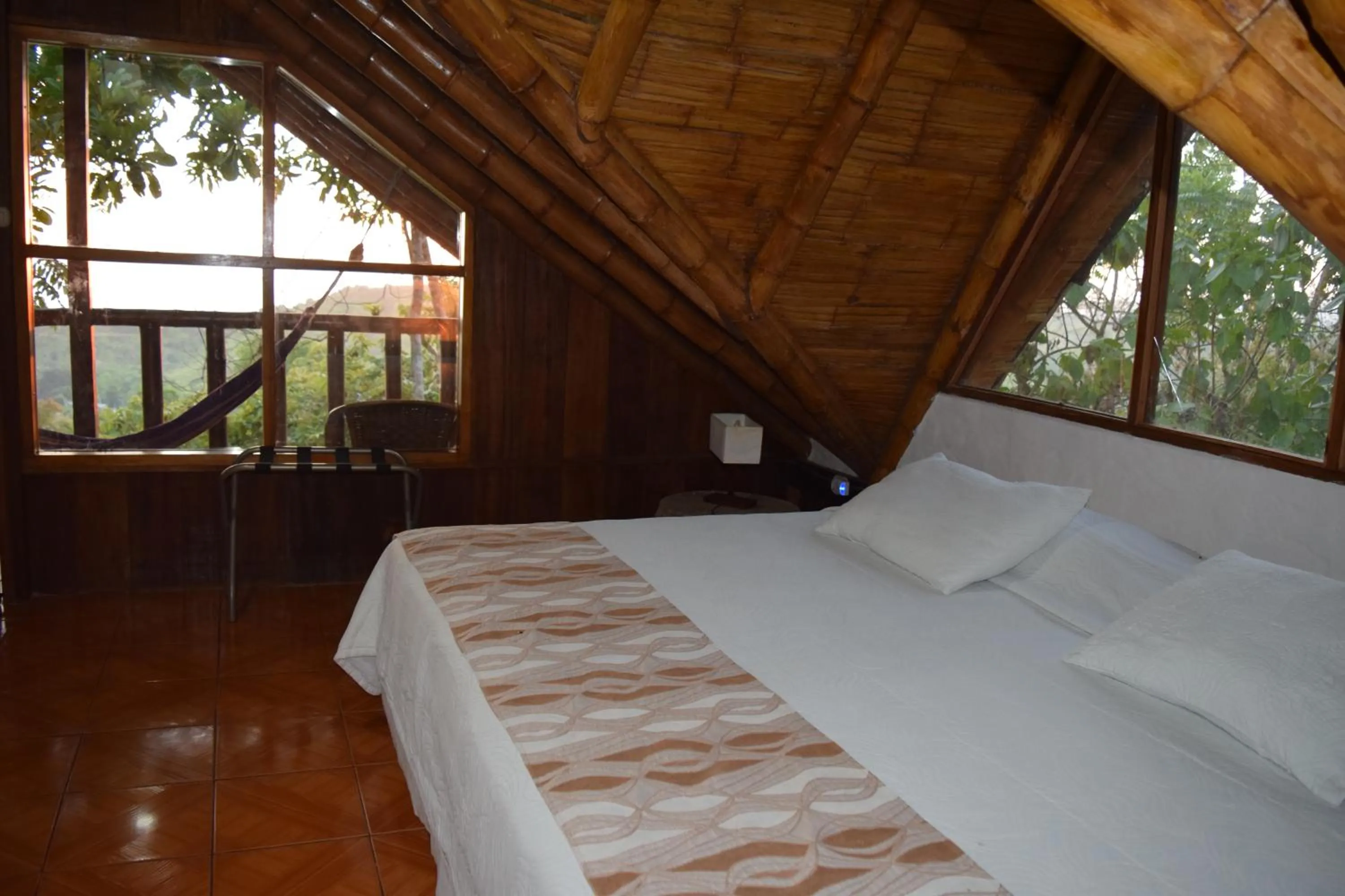 Bed in Samai Lodge Holistic Living