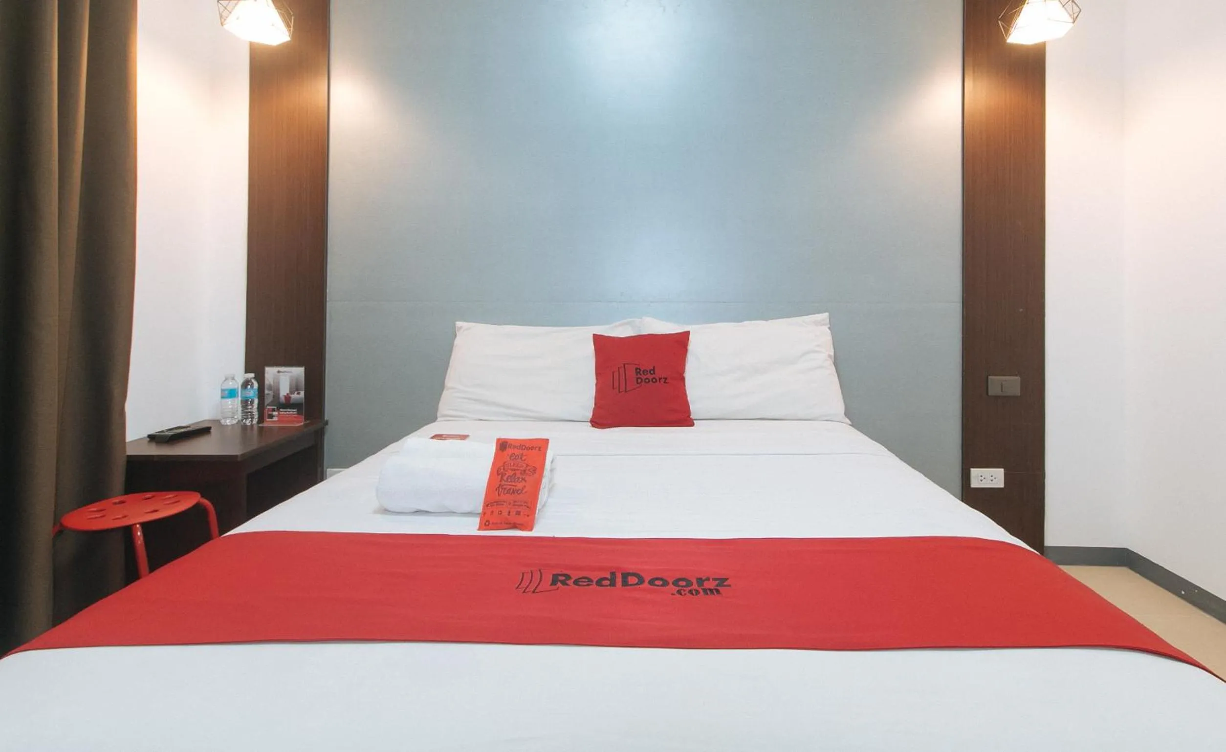 Bed in RedDoorz Plus at EDSA Congressional