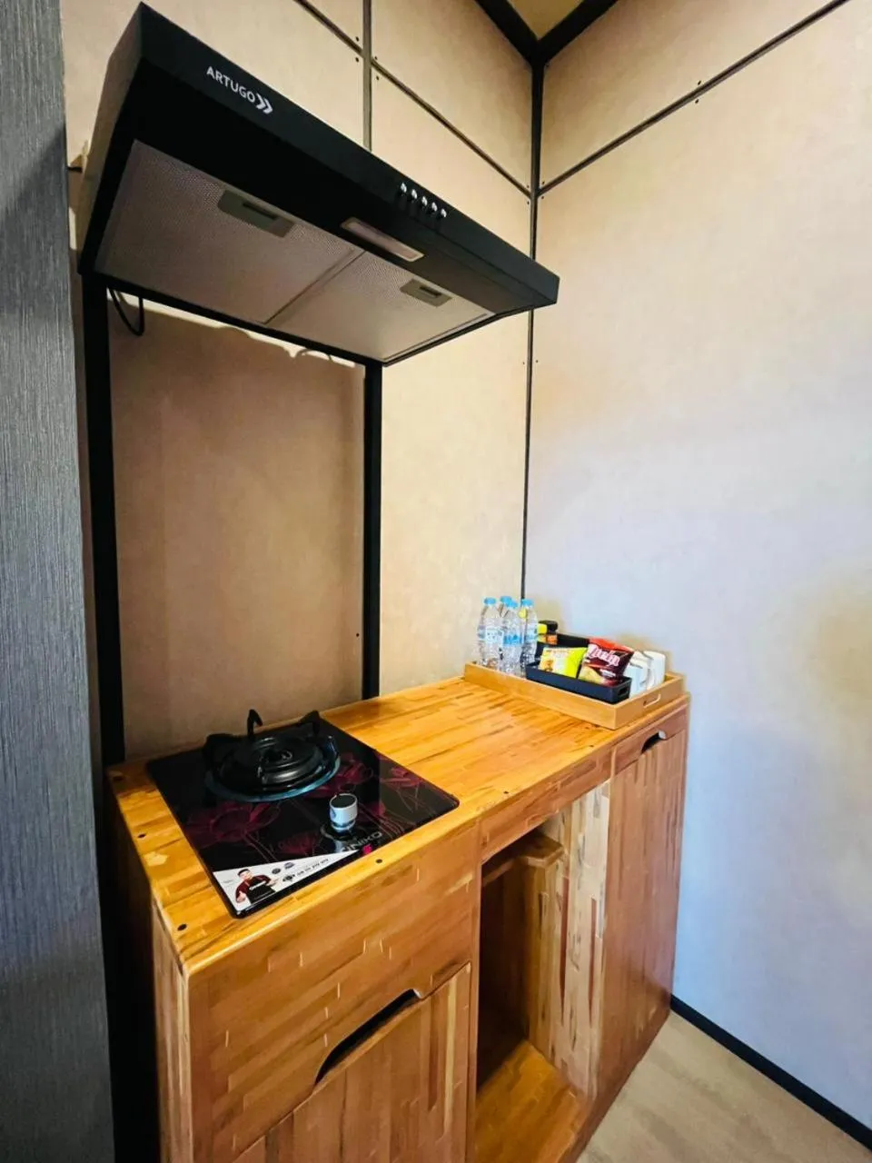 Kitchen or kitchenette in Cemara Indah Hotel