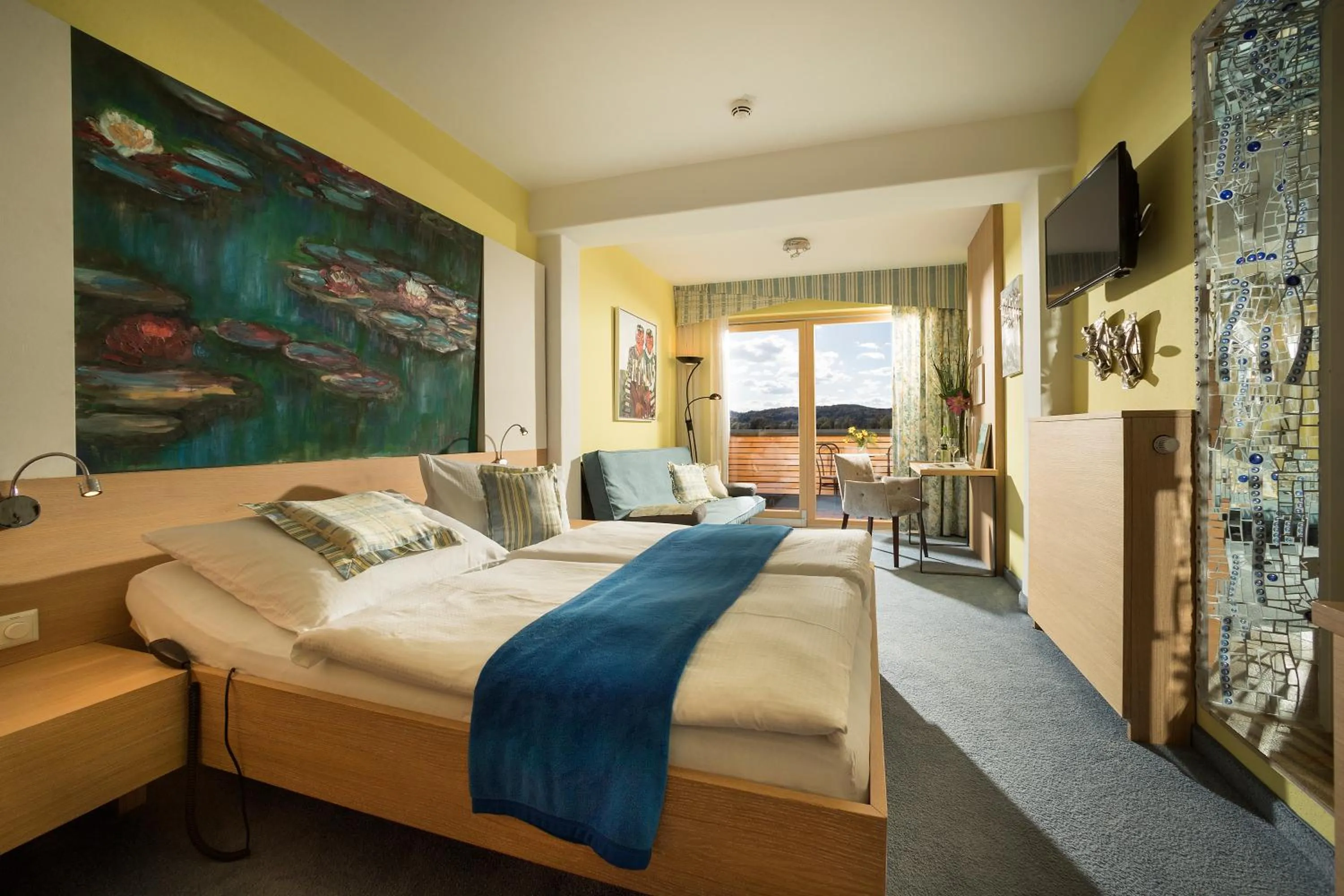 Photo of the whole room in Malerwinkl Restaurant + Kunsthotel