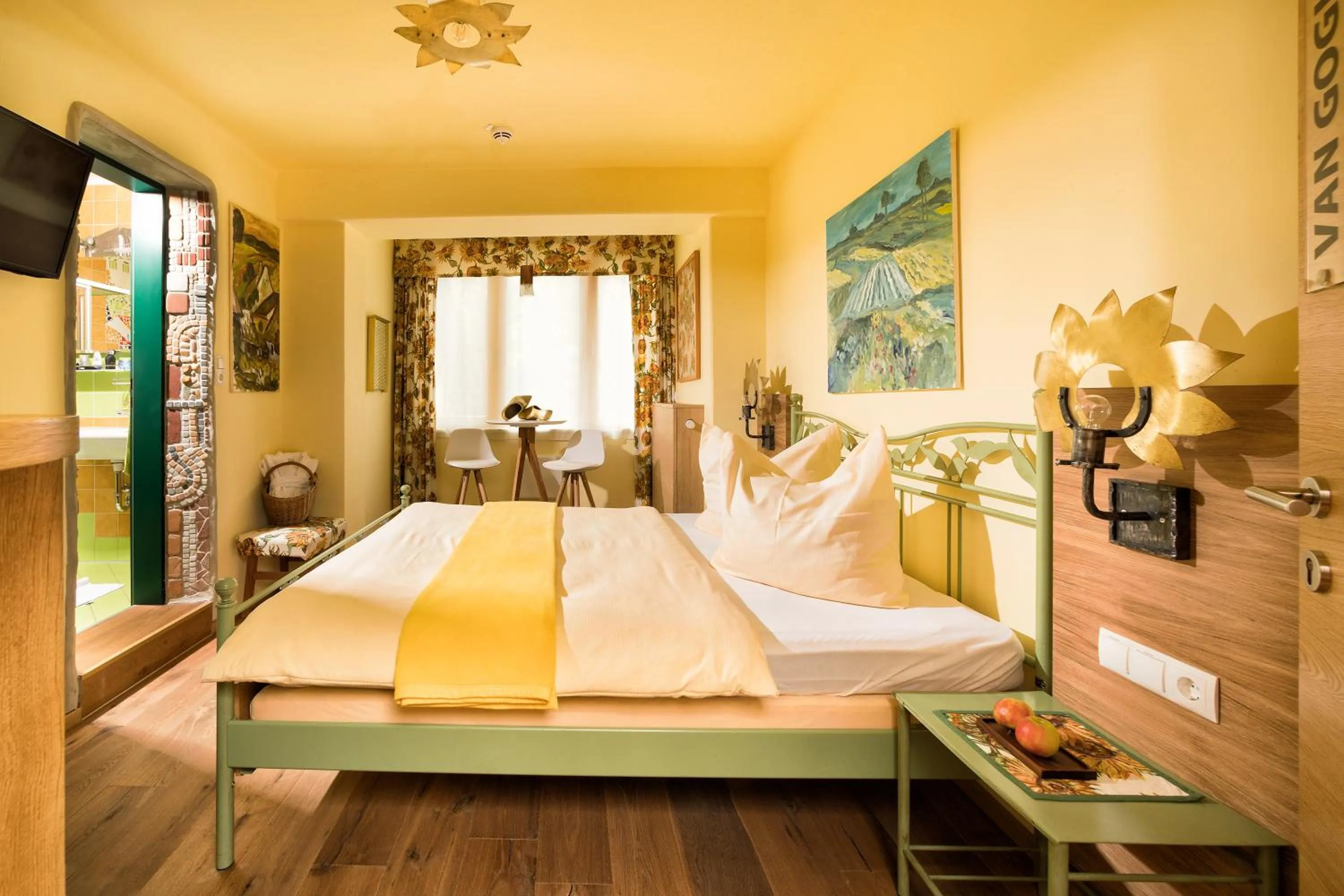 Bedroom in Malerwinkl Restaurant + Kunsthotel