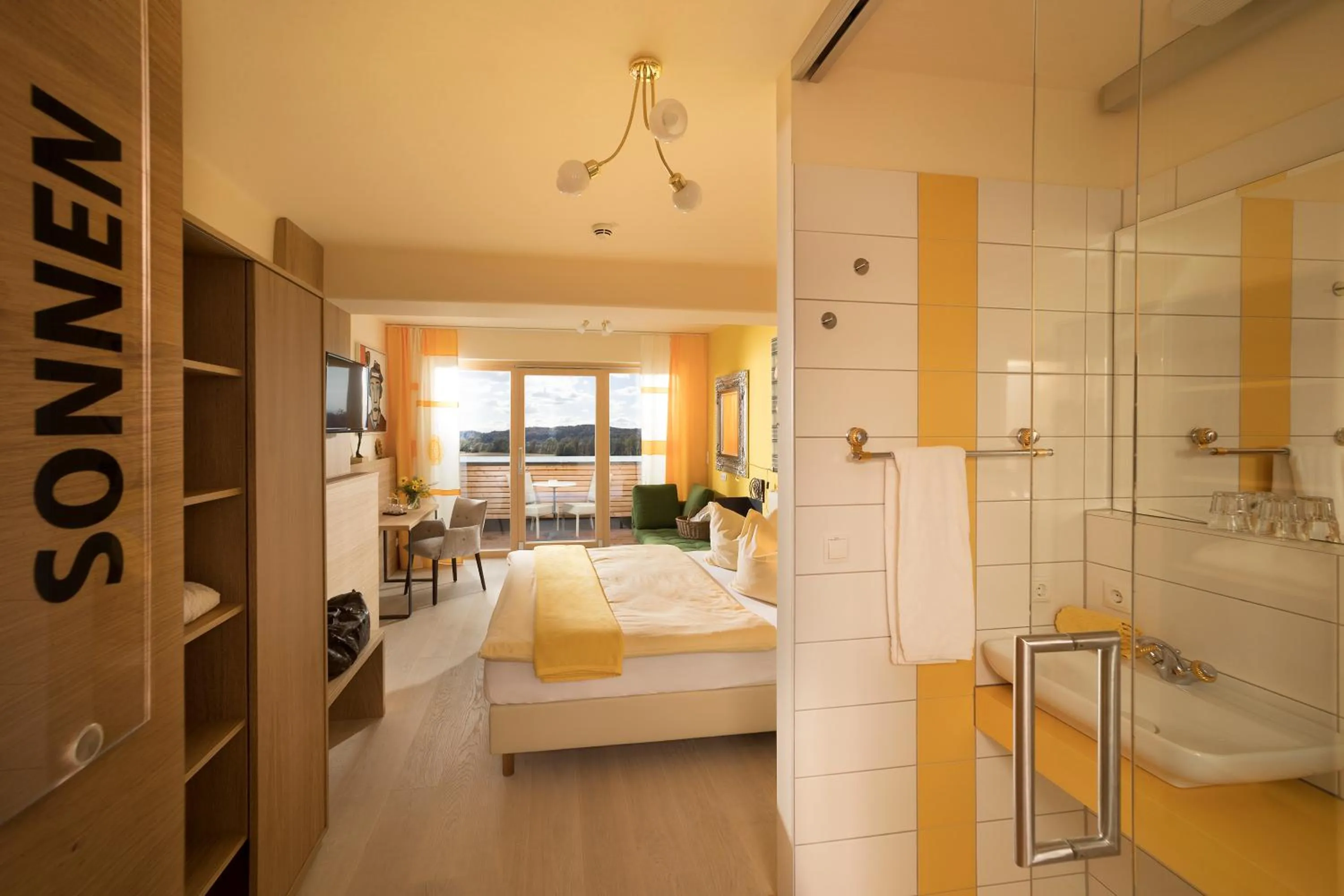 Bedroom in Malerwinkl Restaurant + Kunsthotel