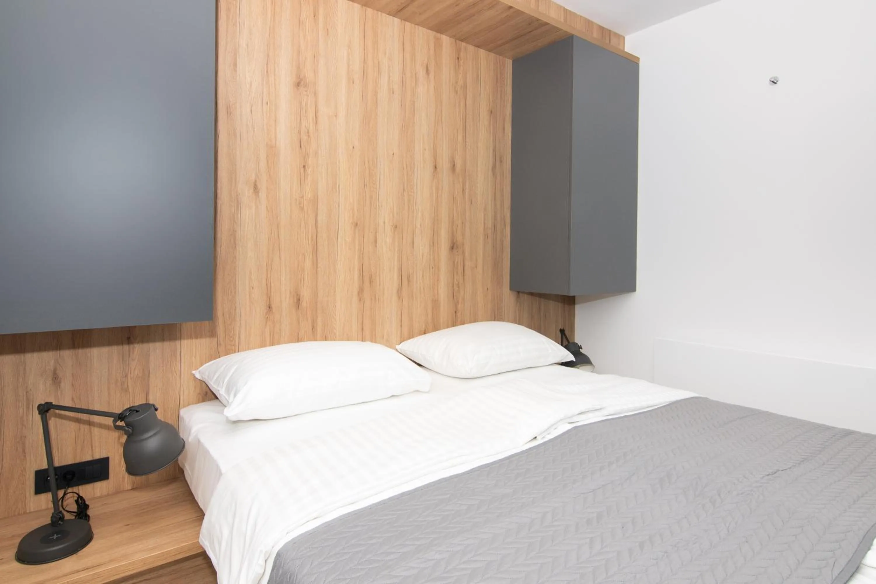 Bed in Forgotten Garden Apartments Portoroz