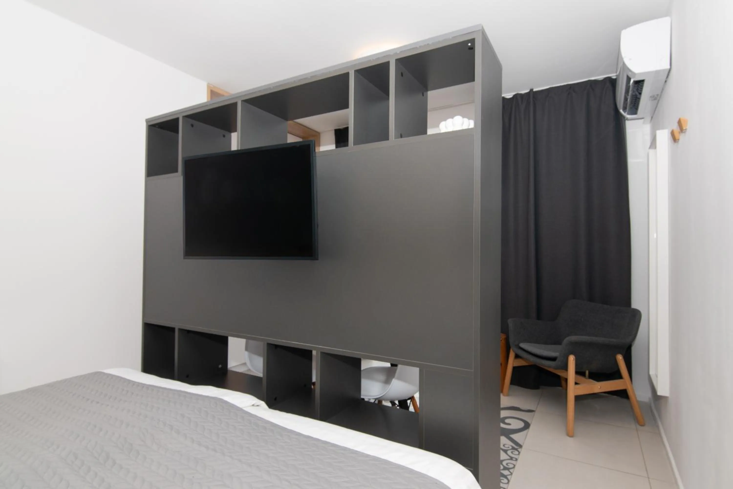 Bed in Forgotten Garden Apartments Portoroz